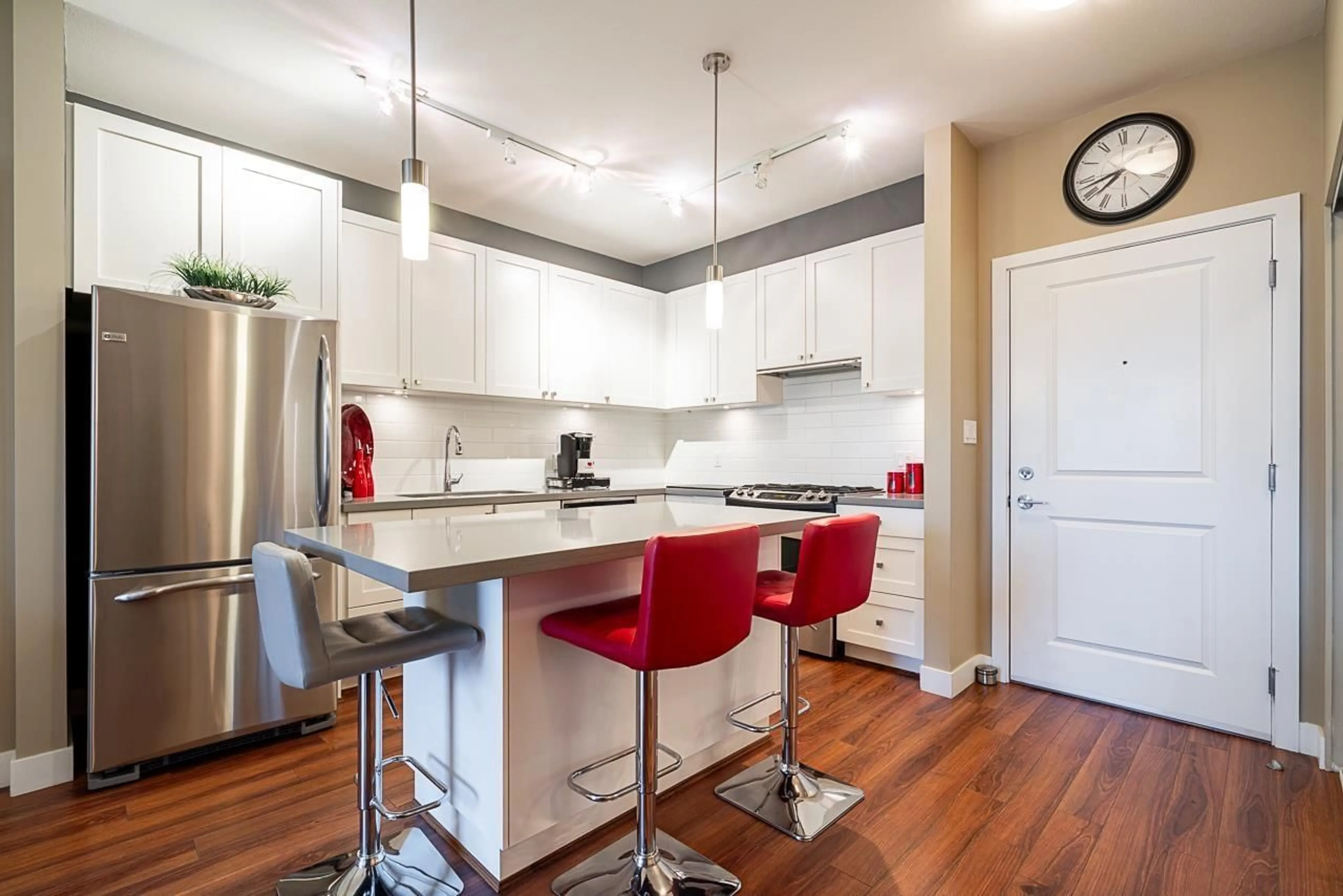 Open concept kitchen, wood/laminate floor for 325 - 15850 26 AVENUE, Surrey British Columbia V3Z2N6