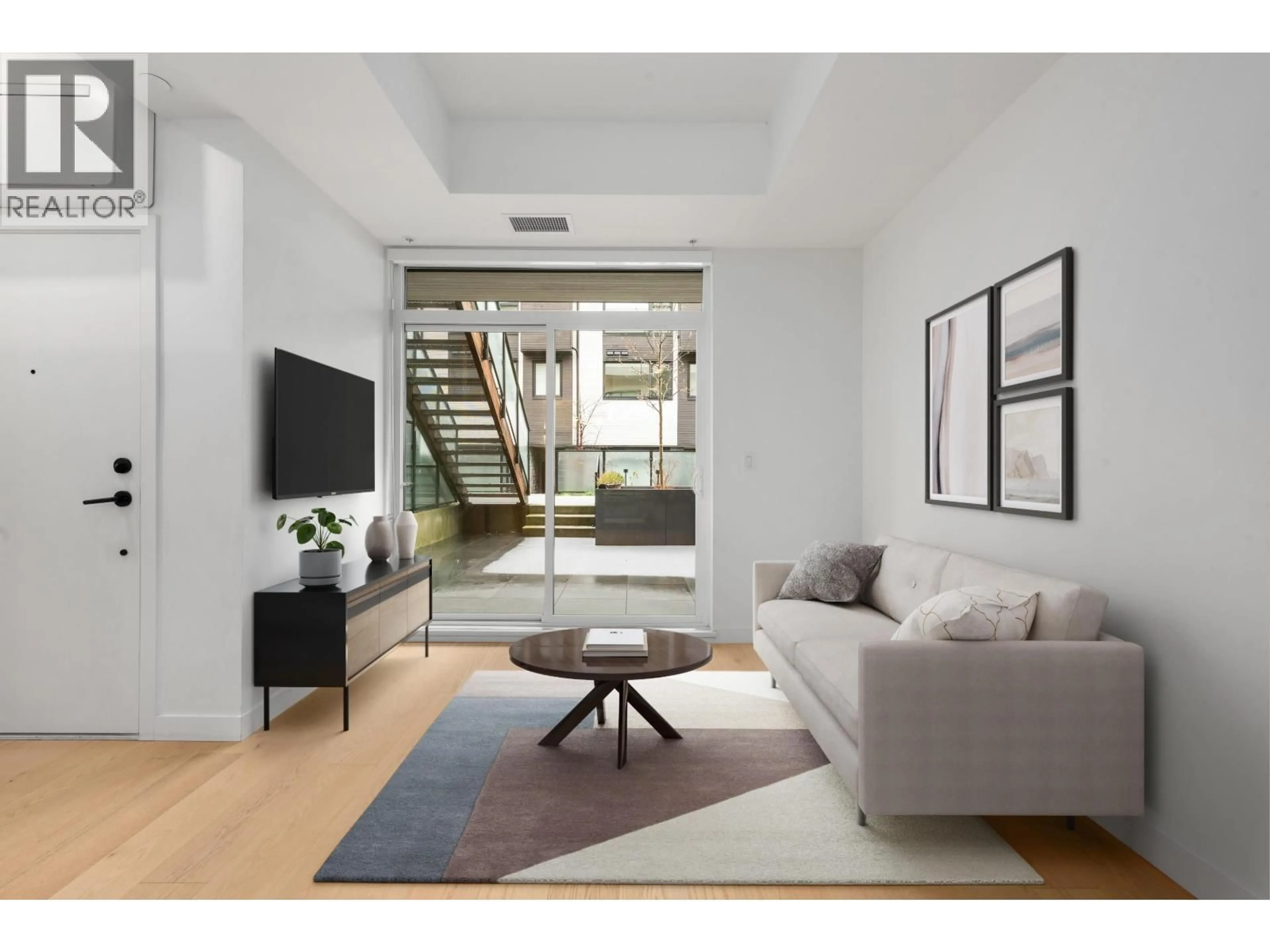 Living room with furniture, unknown for 122 - 650 2ND STREET, North Vancouver British Columbia V7L1E3