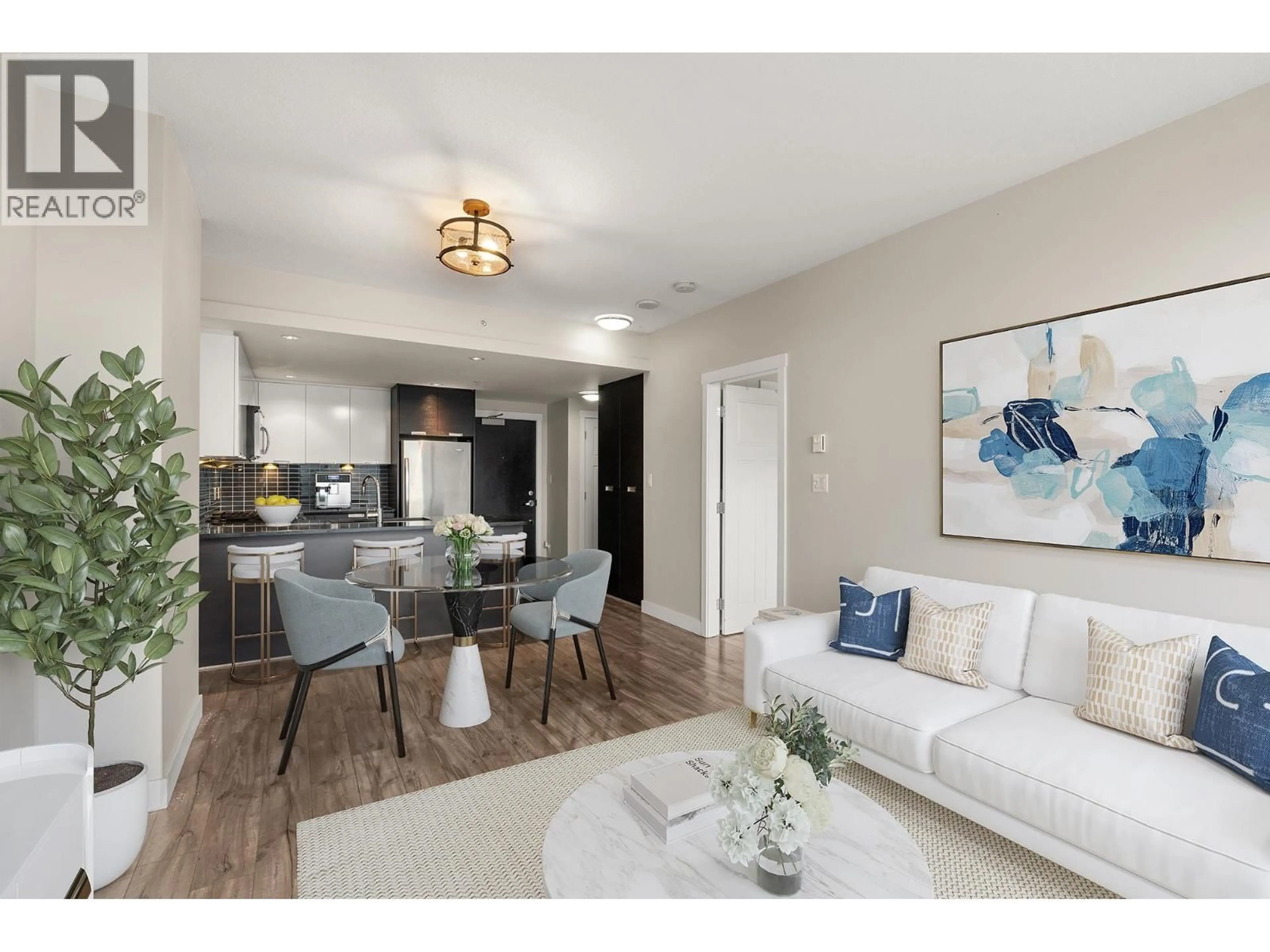 Living room with furniture, wood/laminate floor for 802 - 2968 GLEN DRIVE, Coquitlam British Columbia V3B0C4