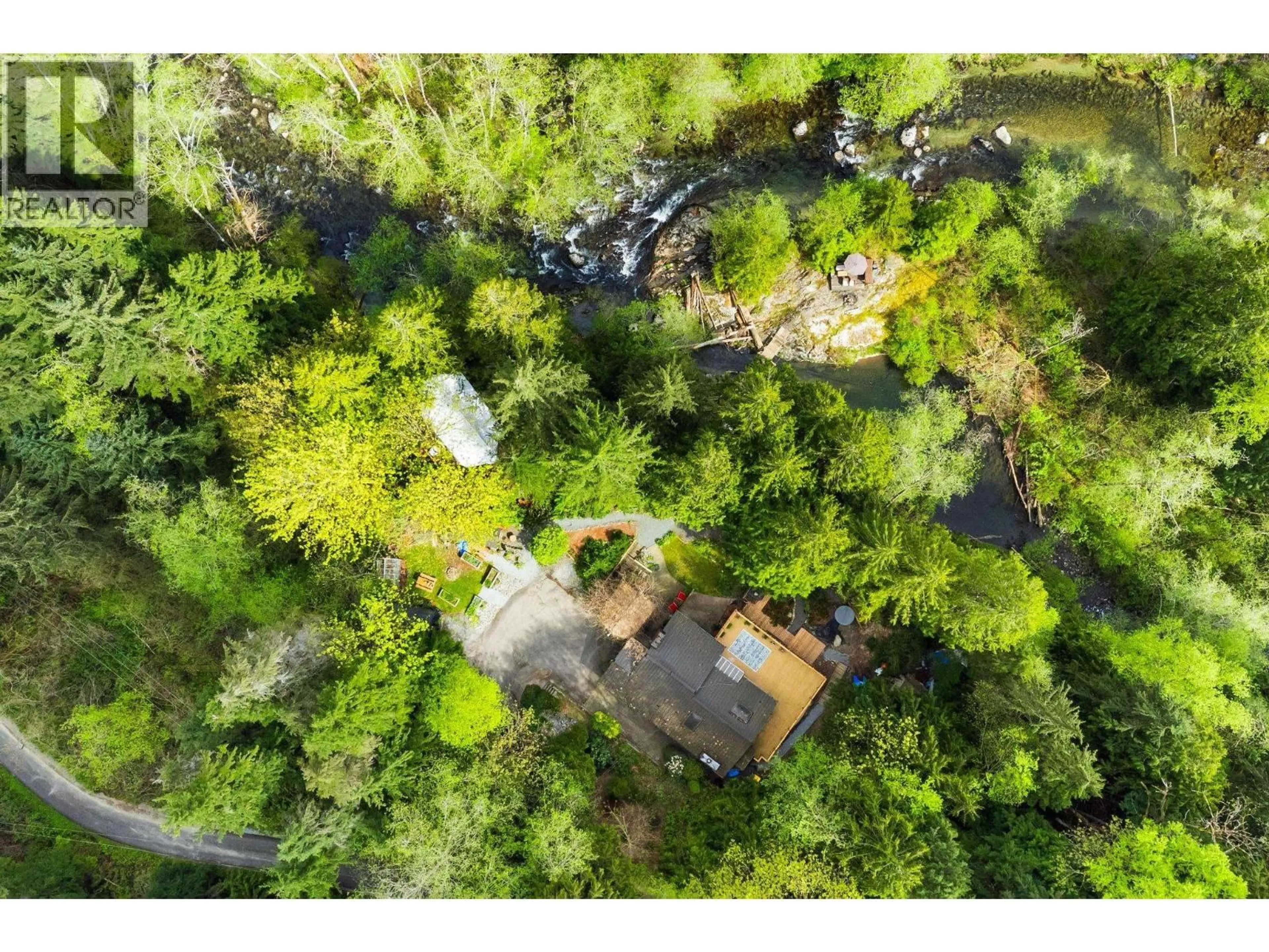 A pic from outside/outdoor area/front of a property/back of a property/a pic from drone, forest/trees view for 24400 130 AVENUE, Maple Ridge British Columbia V4R2S2