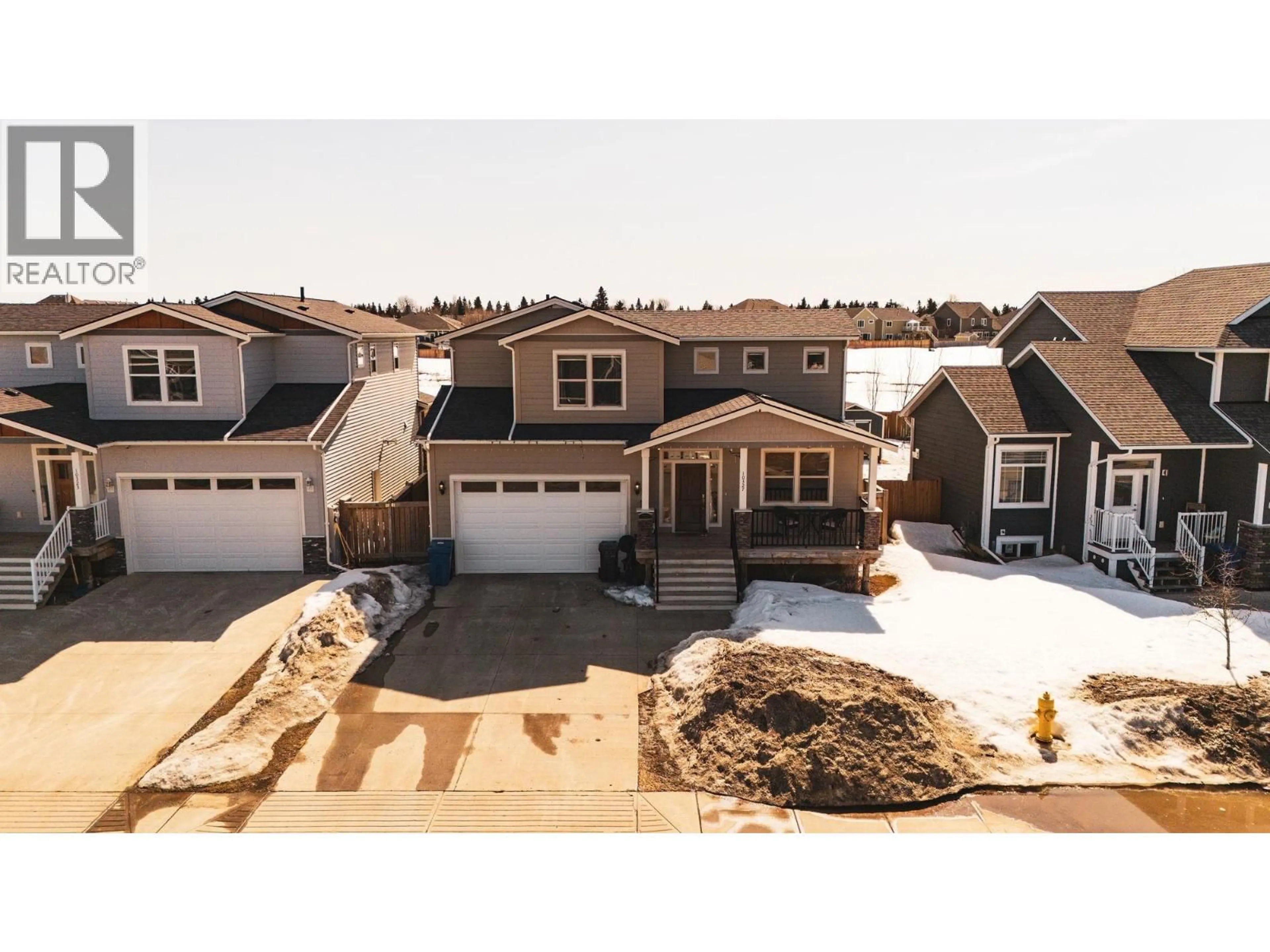 A pic from outside/outdoor area/front of a property/back of a property/a pic from drone, street for 10327 117 AVENUE, Fort St. John British Columbia V1J0K3