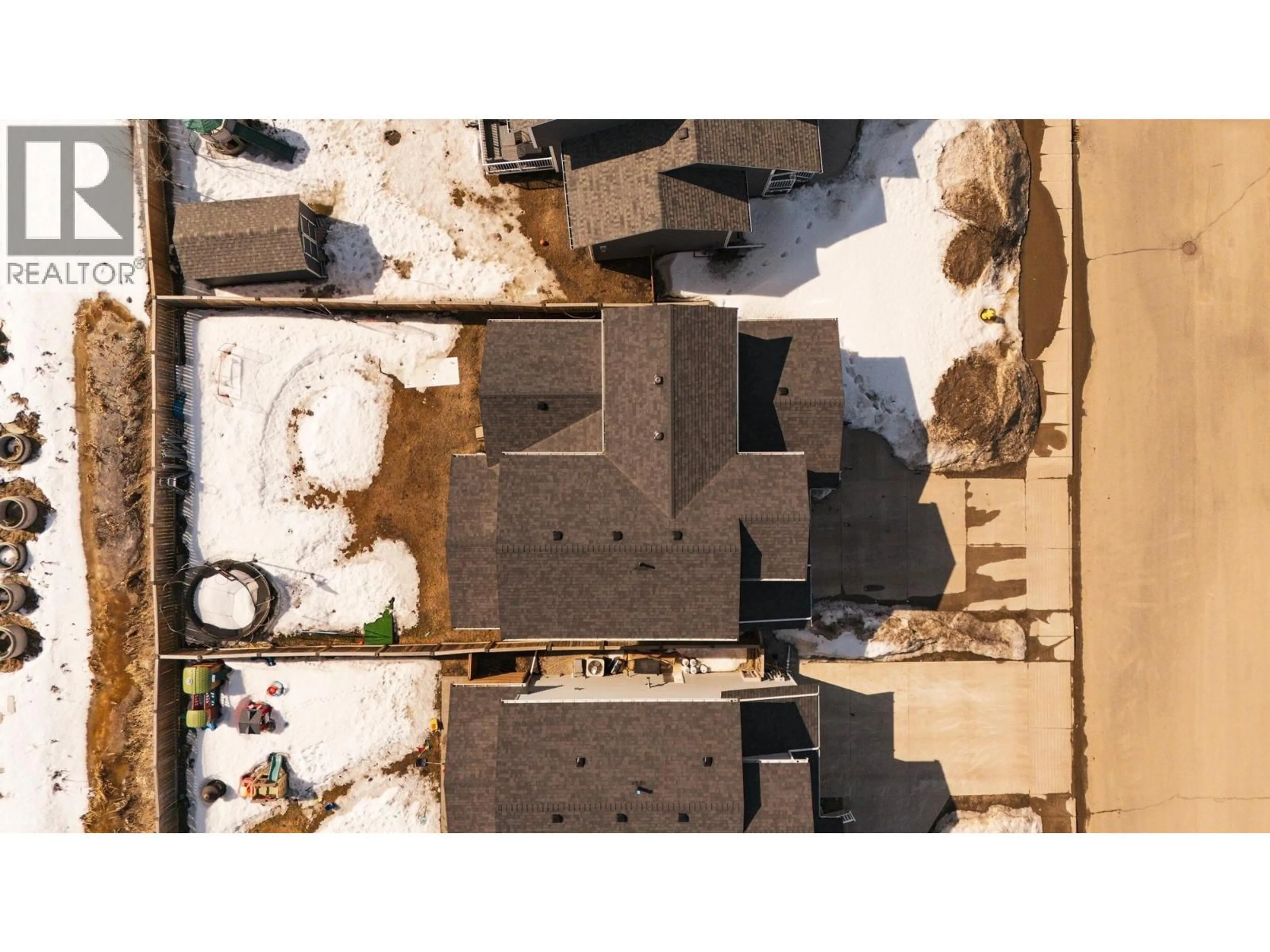 A pic from outside/outdoor area/front of a property/back of a property/a pic from drone, unknown for 10327 117 AVENUE, Fort St. John British Columbia V1J0K3