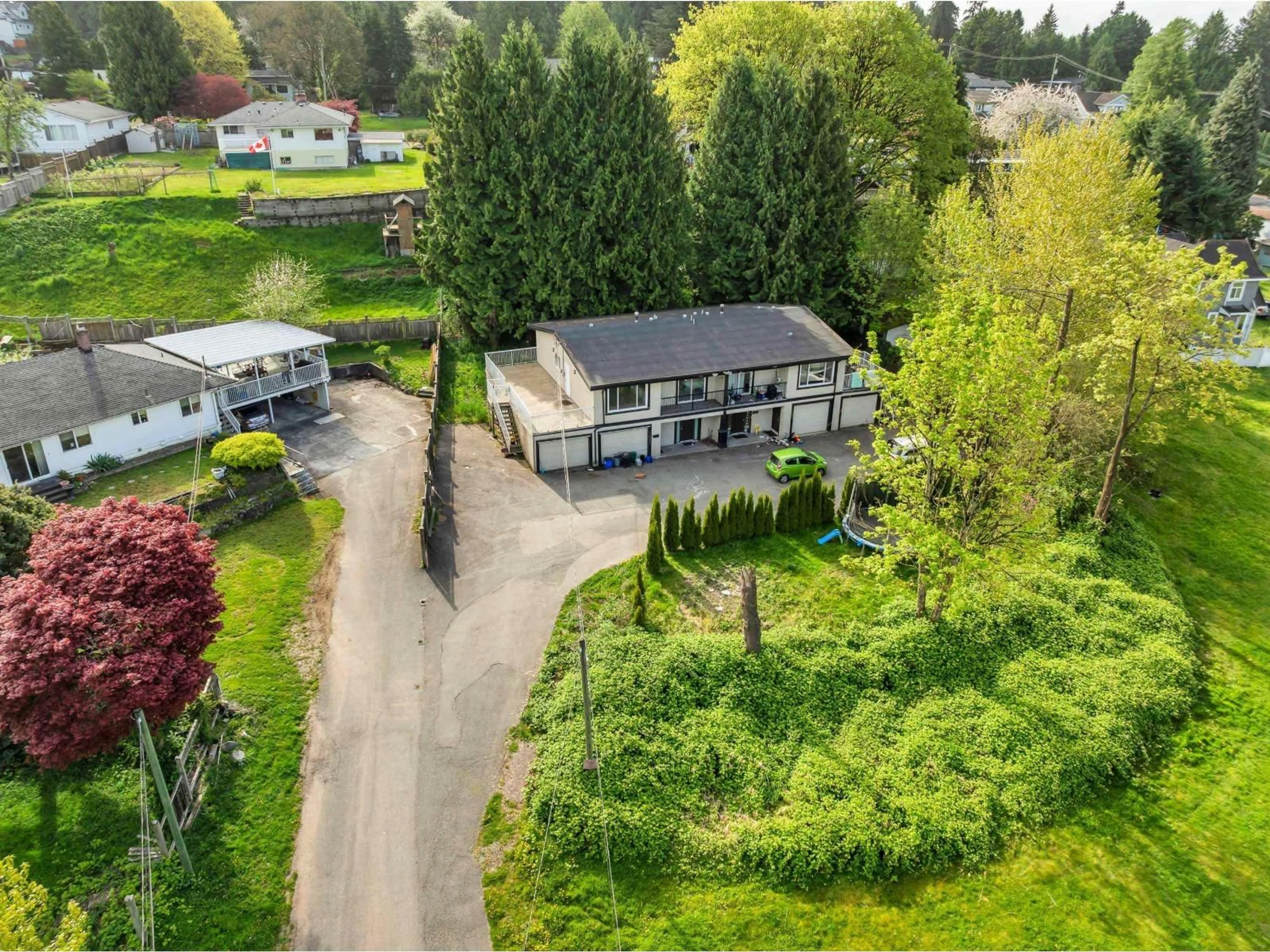 A pic from outside/outdoor area/front of a property/back of a property/a pic from drone, street for 10308 RIVER ROAD, Delta British Columbia V4C2R5