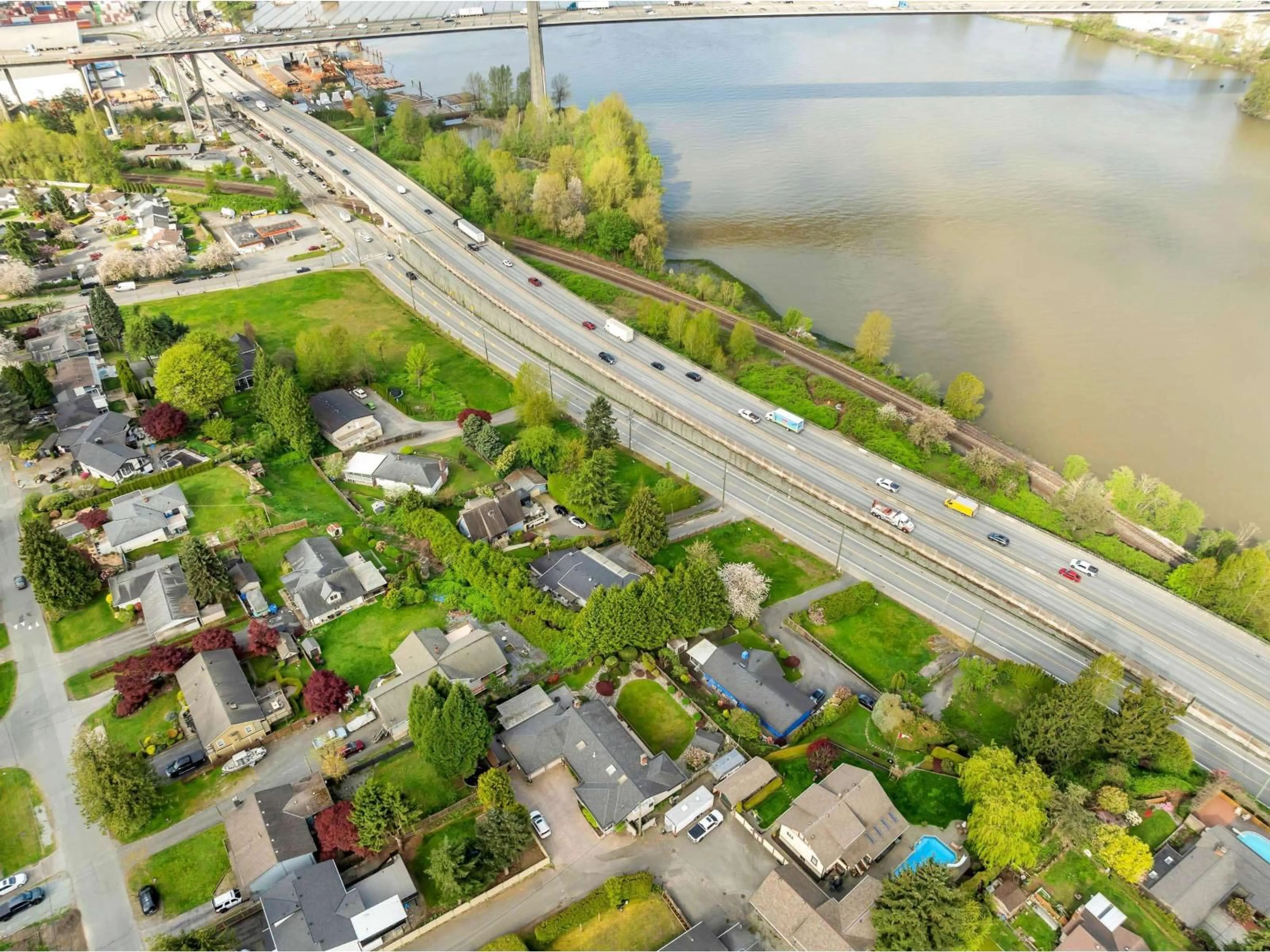 A pic from outside/outdoor area/front of a property/back of a property/a pic from drone, street for 10308 RIVER ROAD, Delta British Columbia V4C2R5