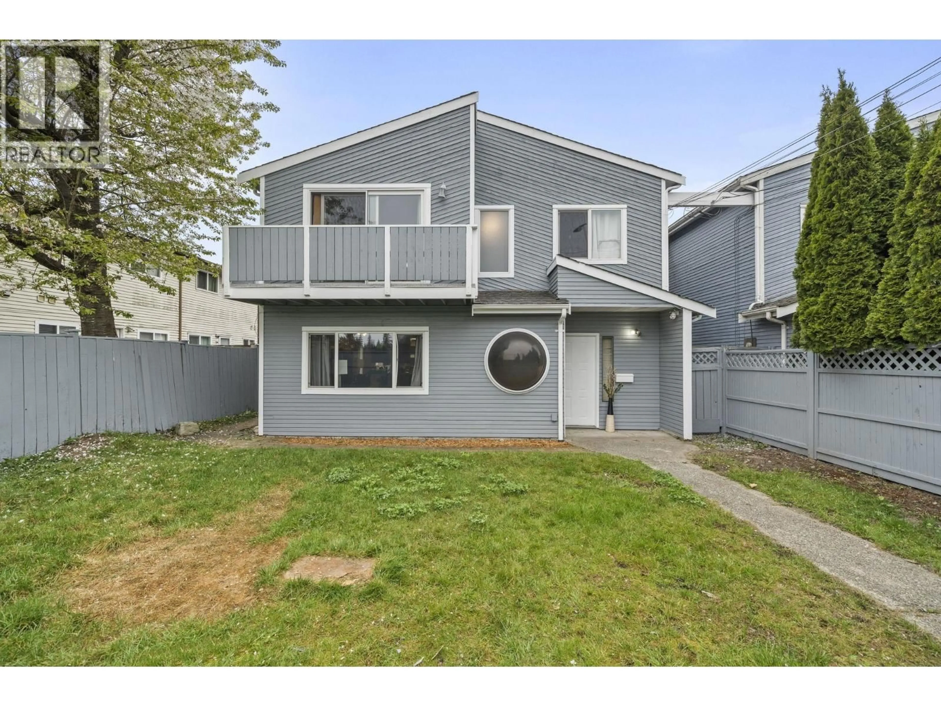 Home with vinyl exterior material, street for 765 CLARKE ROAD, Coquitlam British Columbia V3J7P3