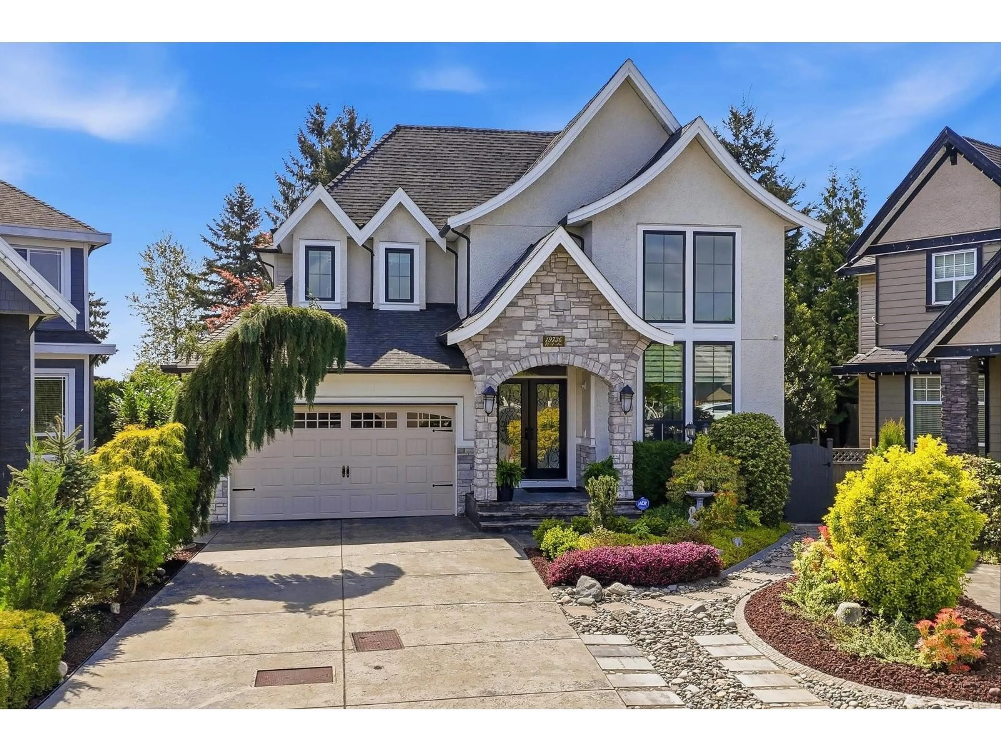 Home with vinyl exterior material, street for 19736 71A AVENUE, Langley British Columbia V2Y3G8