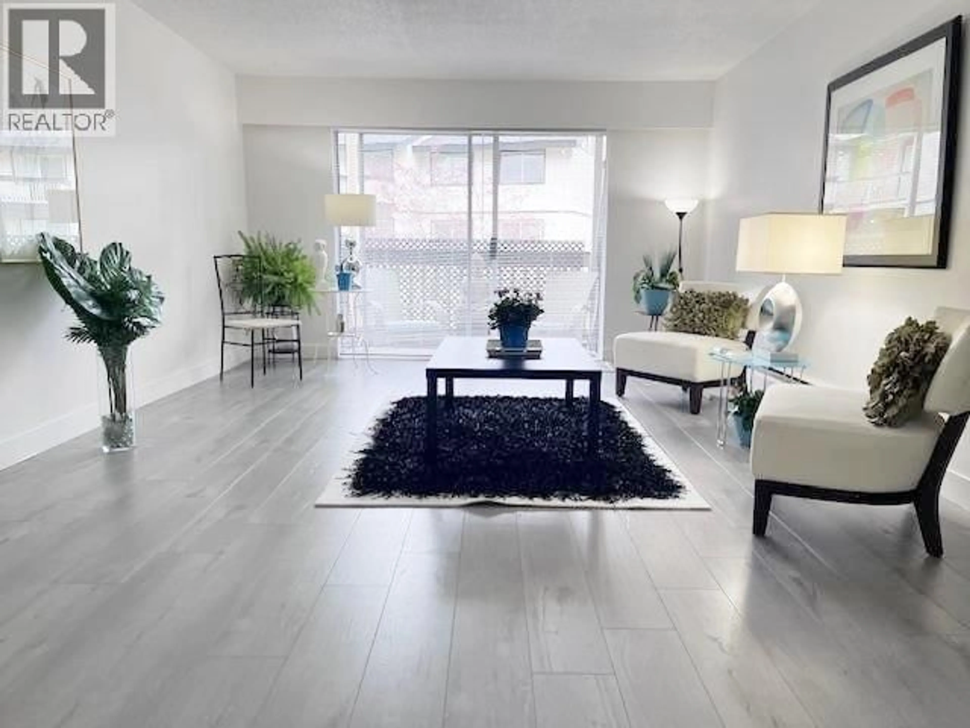 Living room with furniture, unknown for 212 - 780 PREMIER STREET, North Vancouver British Columbia V7J2G8