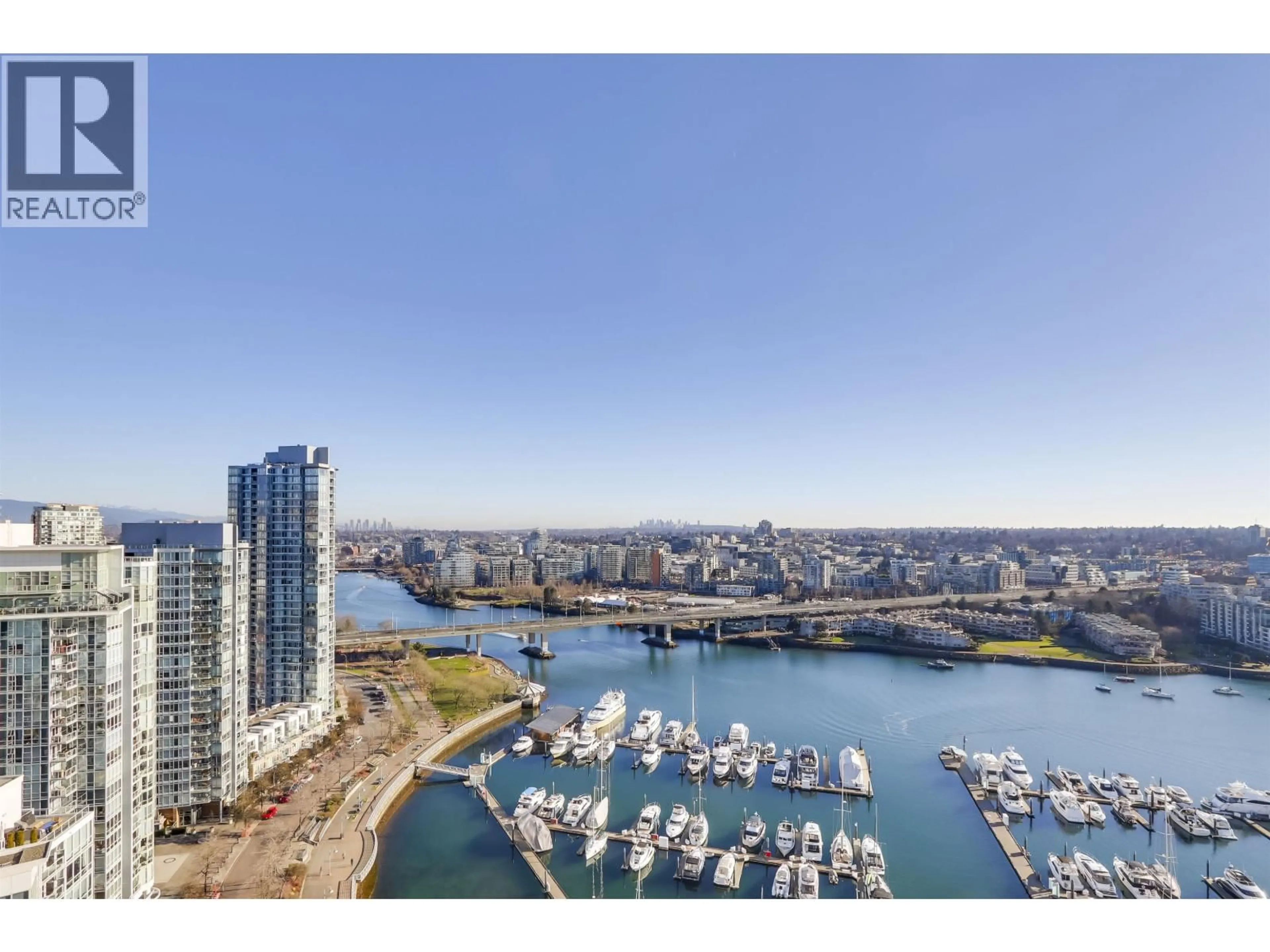 A pic from outside/outdoor area/front of a property/back of a property/a pic from drone, water/lake/river/ocean view for 3002 - 1199 MARINASIDE CRESCENT, Vancouver British Columbia V6Z2Y2