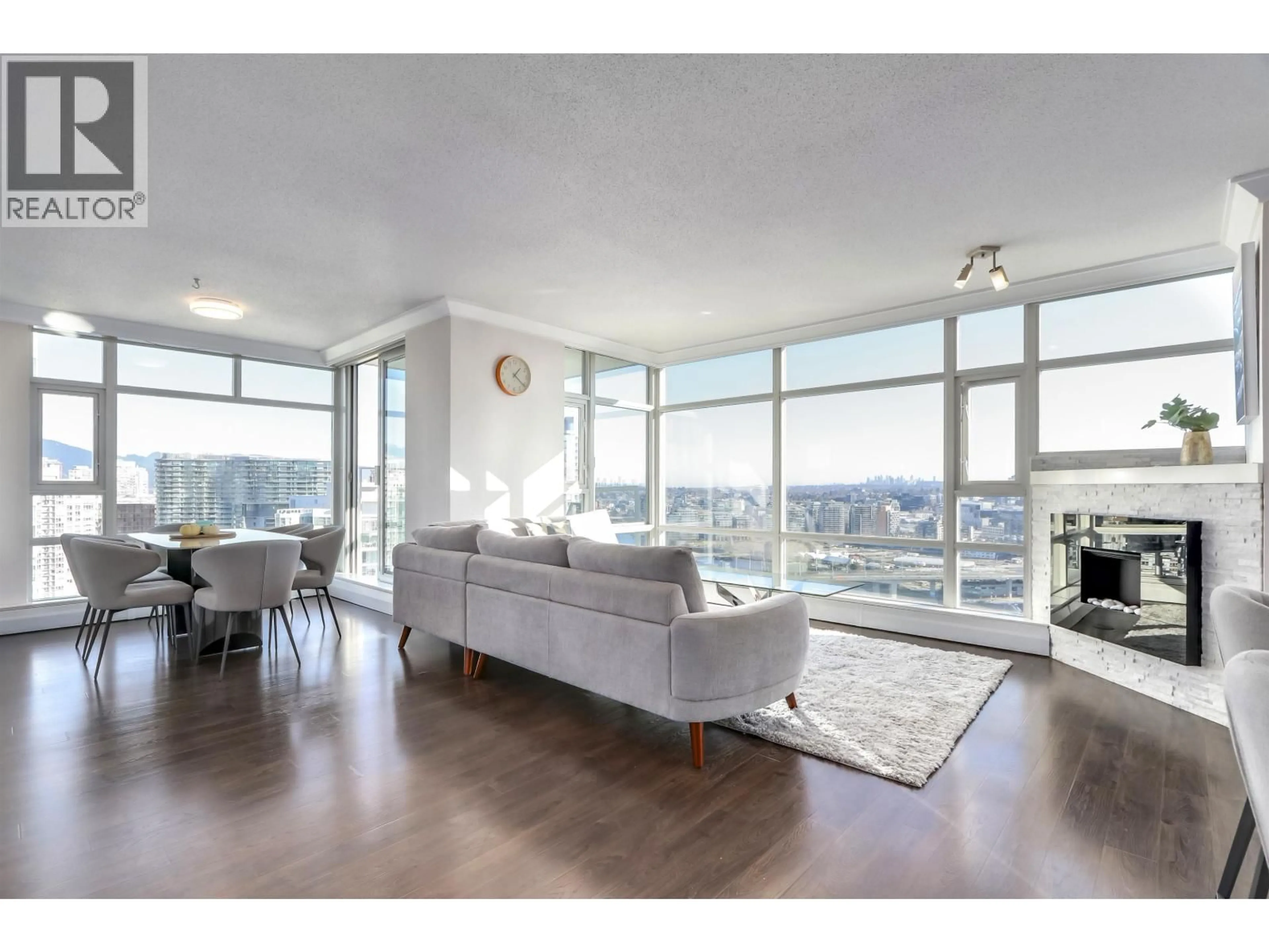 Living room with furniture, unknown for 3002 - 1199 MARINASIDE CRESCENT, Vancouver British Columbia V6Z2Y2