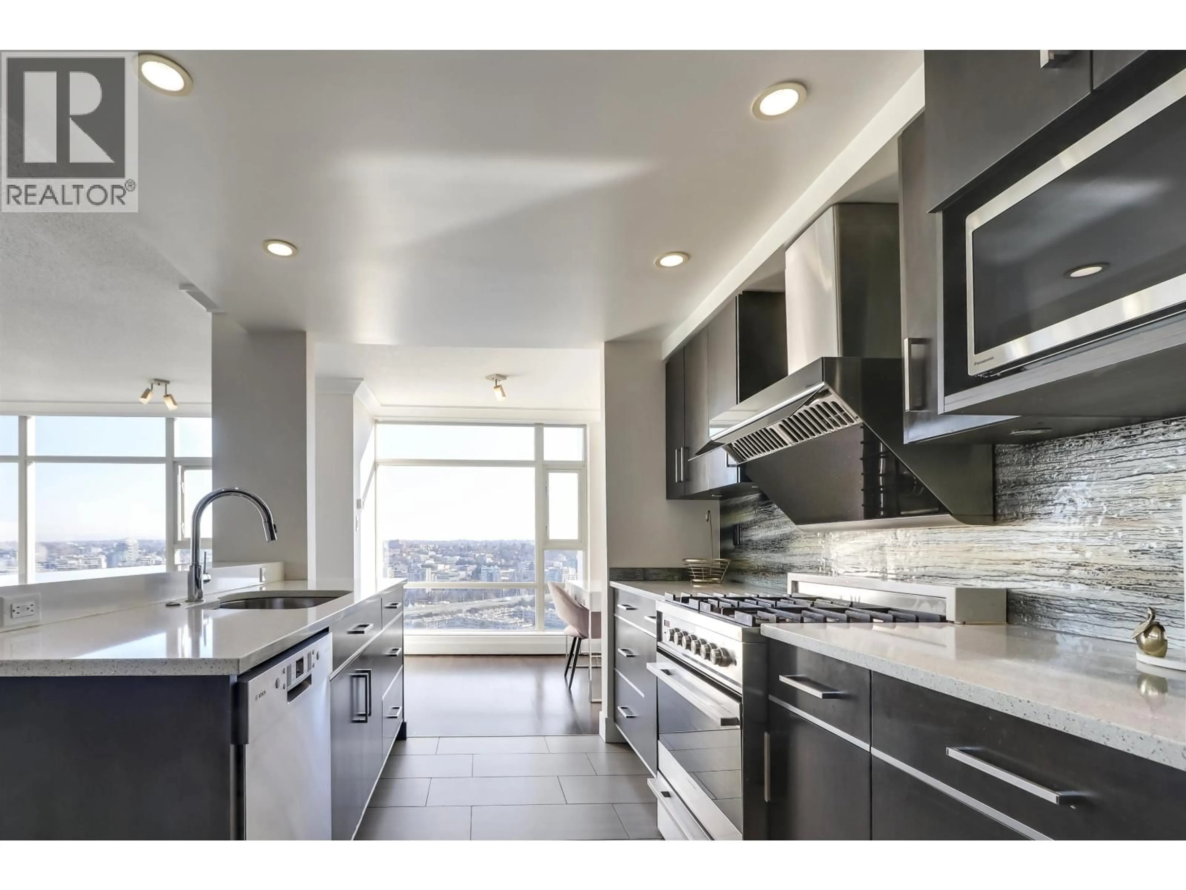 Contemporary kitchen, ceramic/tile floor for 3002 - 1199 MARINASIDE CRESCENT, Vancouver British Columbia V6Z2Y2