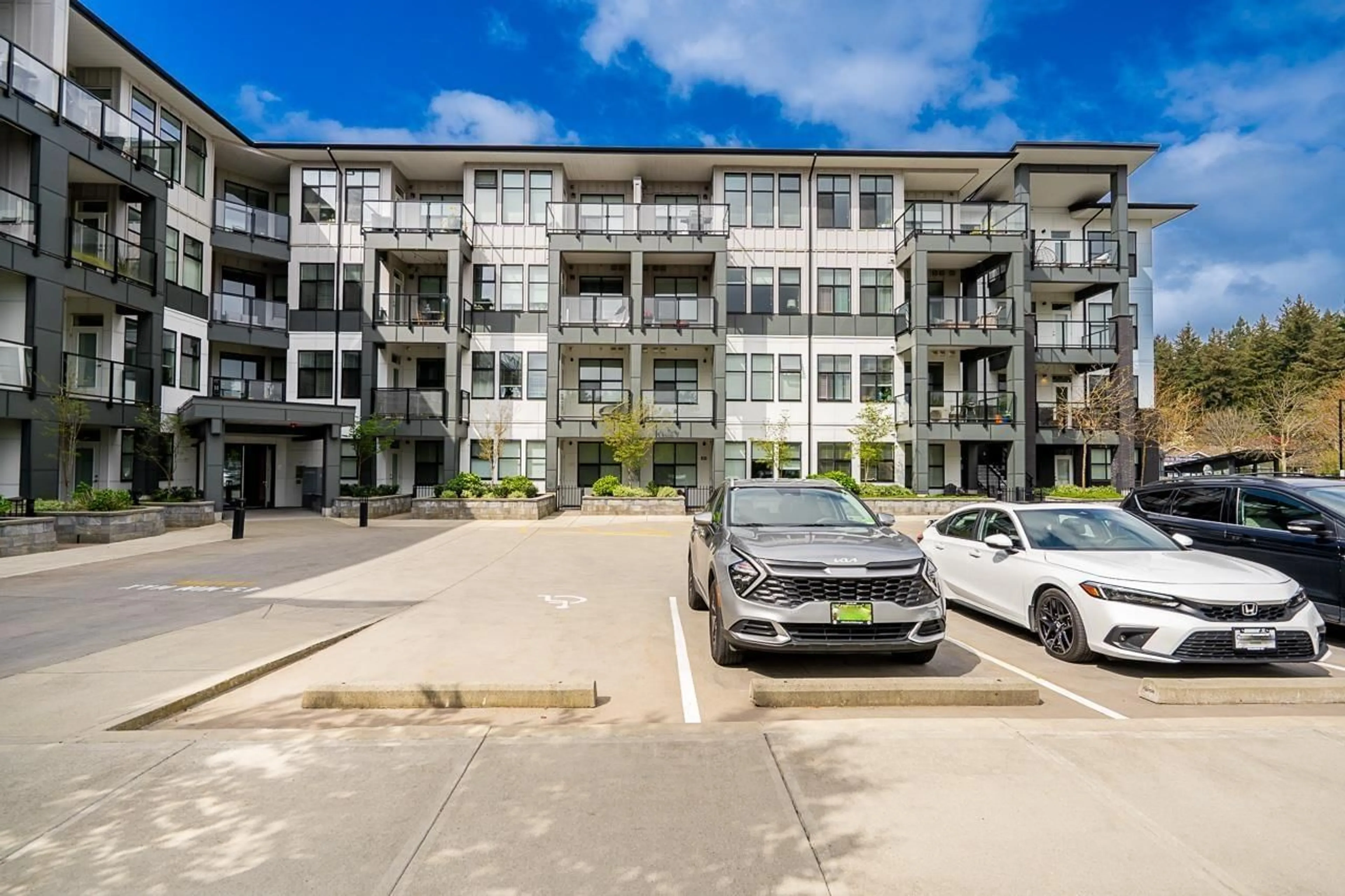 A pic from outside/outdoor area/front of a property/back of a property/a pic from drone, unknown for 205 - 2120 GLADWIN ROAD, Abbotsford British Columbia V2S0L7