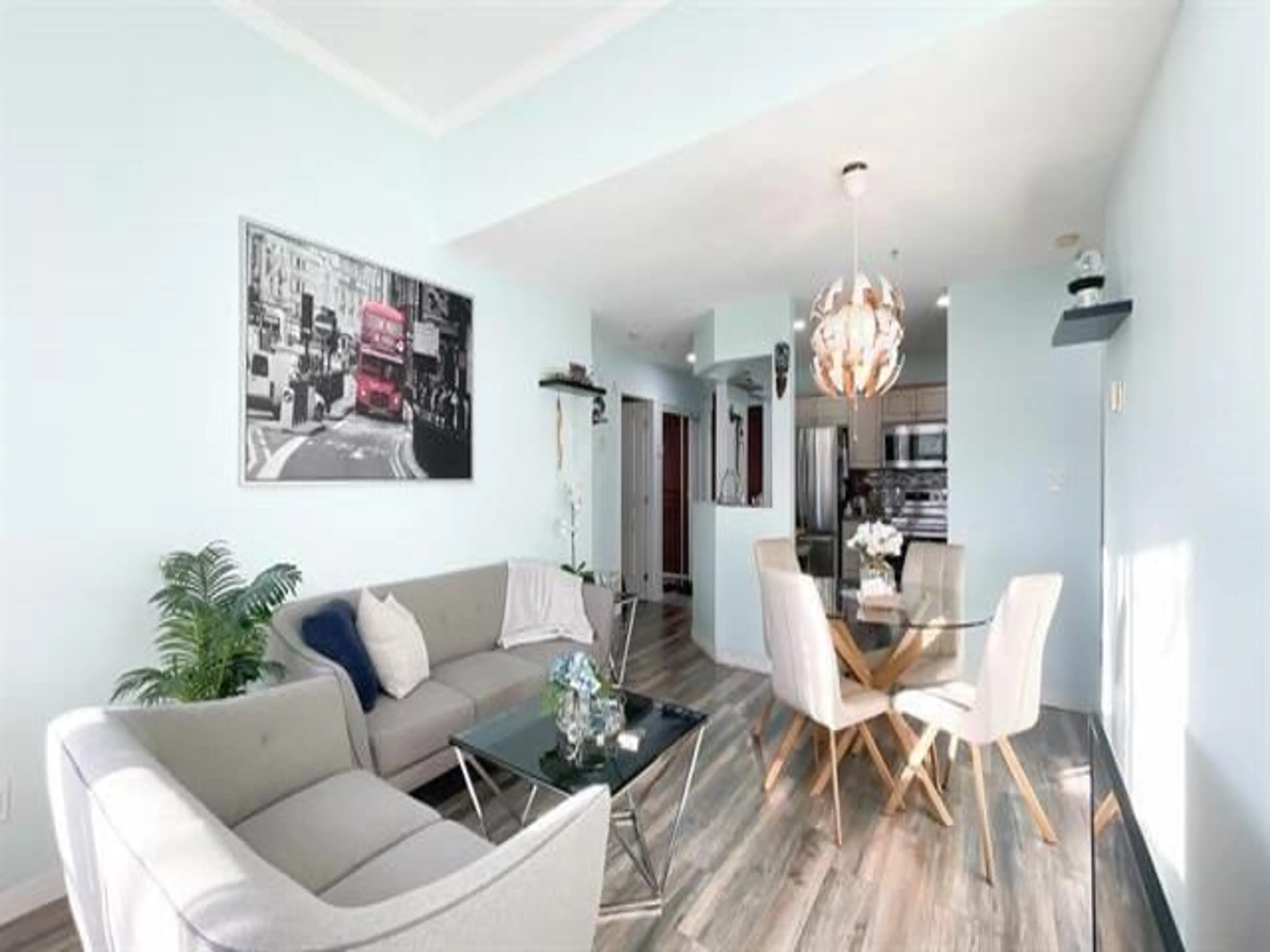 Living room with furniture, wood/laminate floor for 408 - 33480 GEORGE FERGUSON WAY, Abbotsford British Columbia V2S8G1