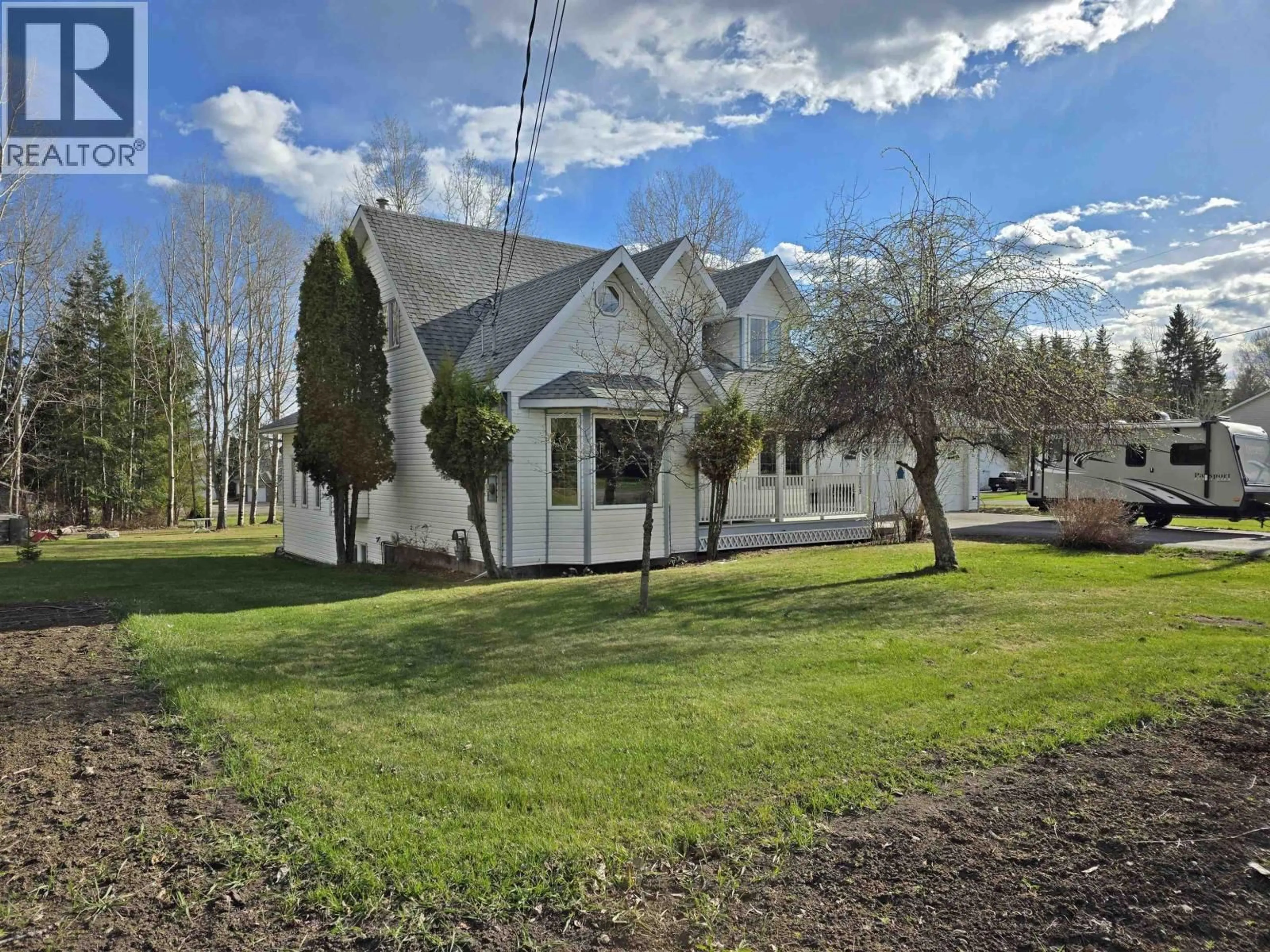 A pic from outside/outdoor area/front of a property/back of a property/a pic from drone, street for 3039 BELCARRA ROAD, Quesnel British Columbia V2J5Y1