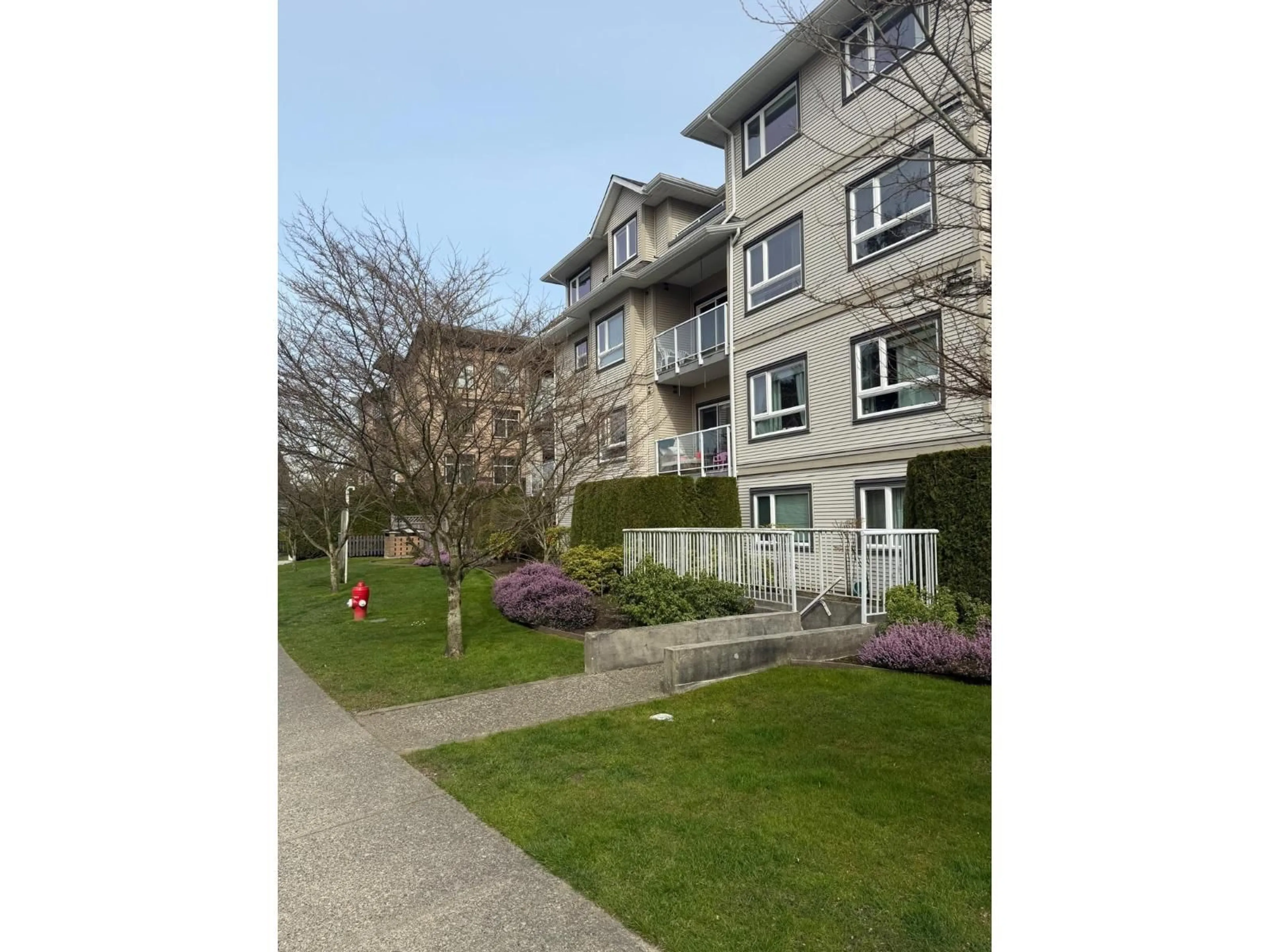 A pic from outside/outdoor area/front of a property/back of a property/a pic from drone, street for 111 - 8142 120A STREET, Surrey British Columbia V3W0N1