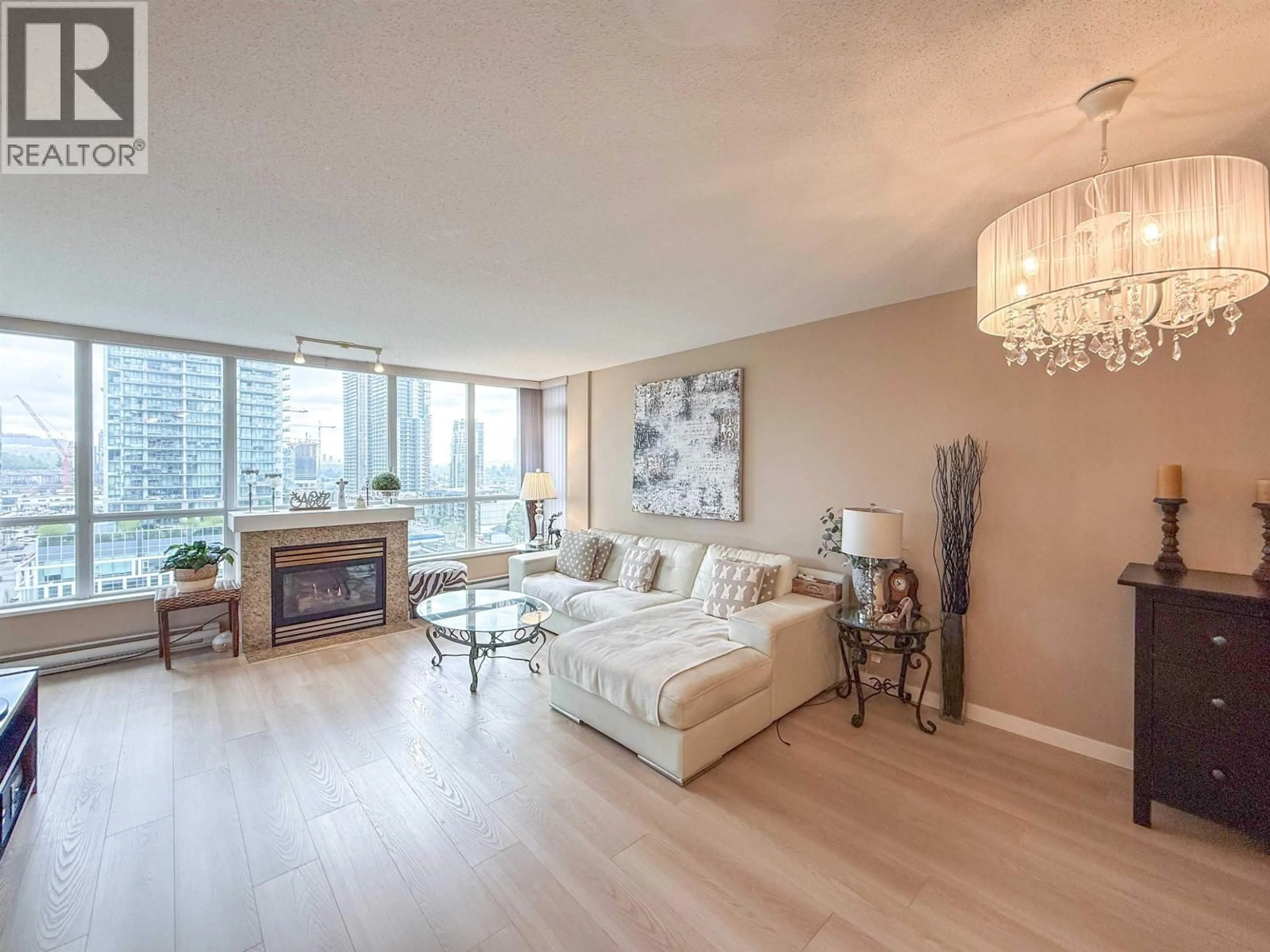 Living room with furniture, wood/laminate floor for 1507 - 2138 MADISON AVENUE, Burnaby British Columbia V5C6T6