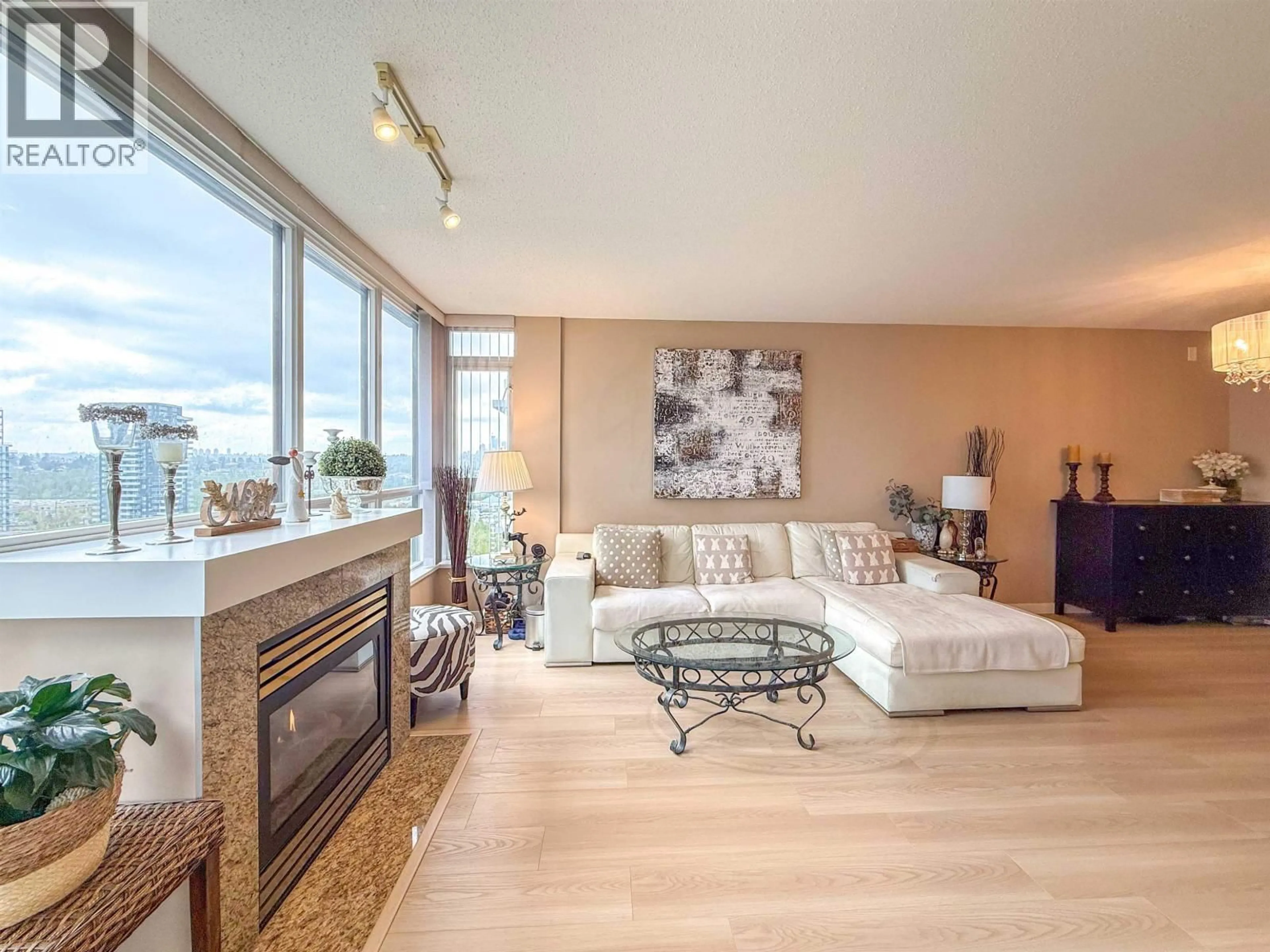 Living room with furniture, wood/laminate floor for 1507 - 2138 MADISON AVENUE, Burnaby British Columbia V5C6T6