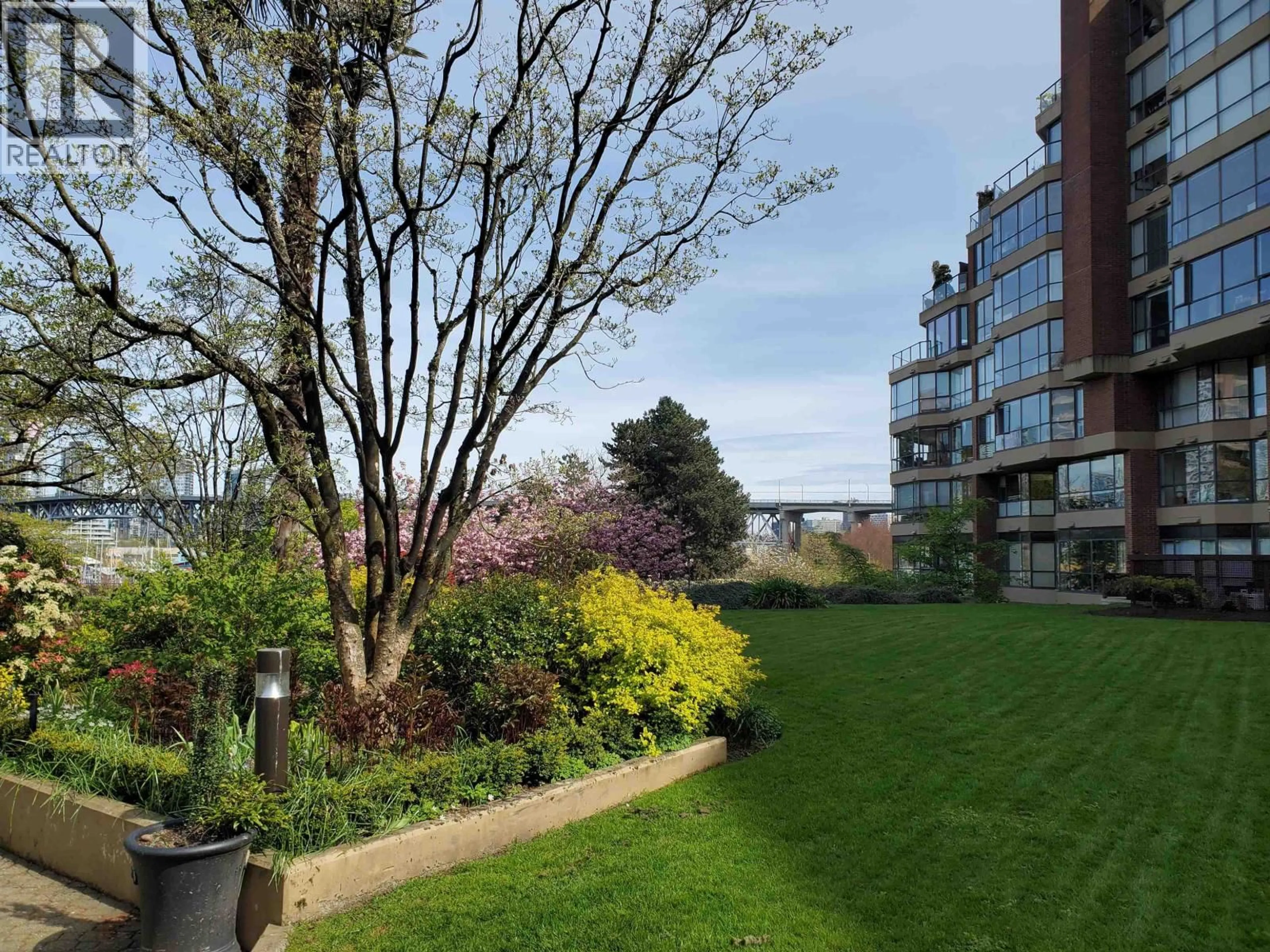 Patio, water/lake/river/ocean view for 103 - 1470 PENNYFARTHING DRIVE, Vancouver British Columbia V6J4Y2