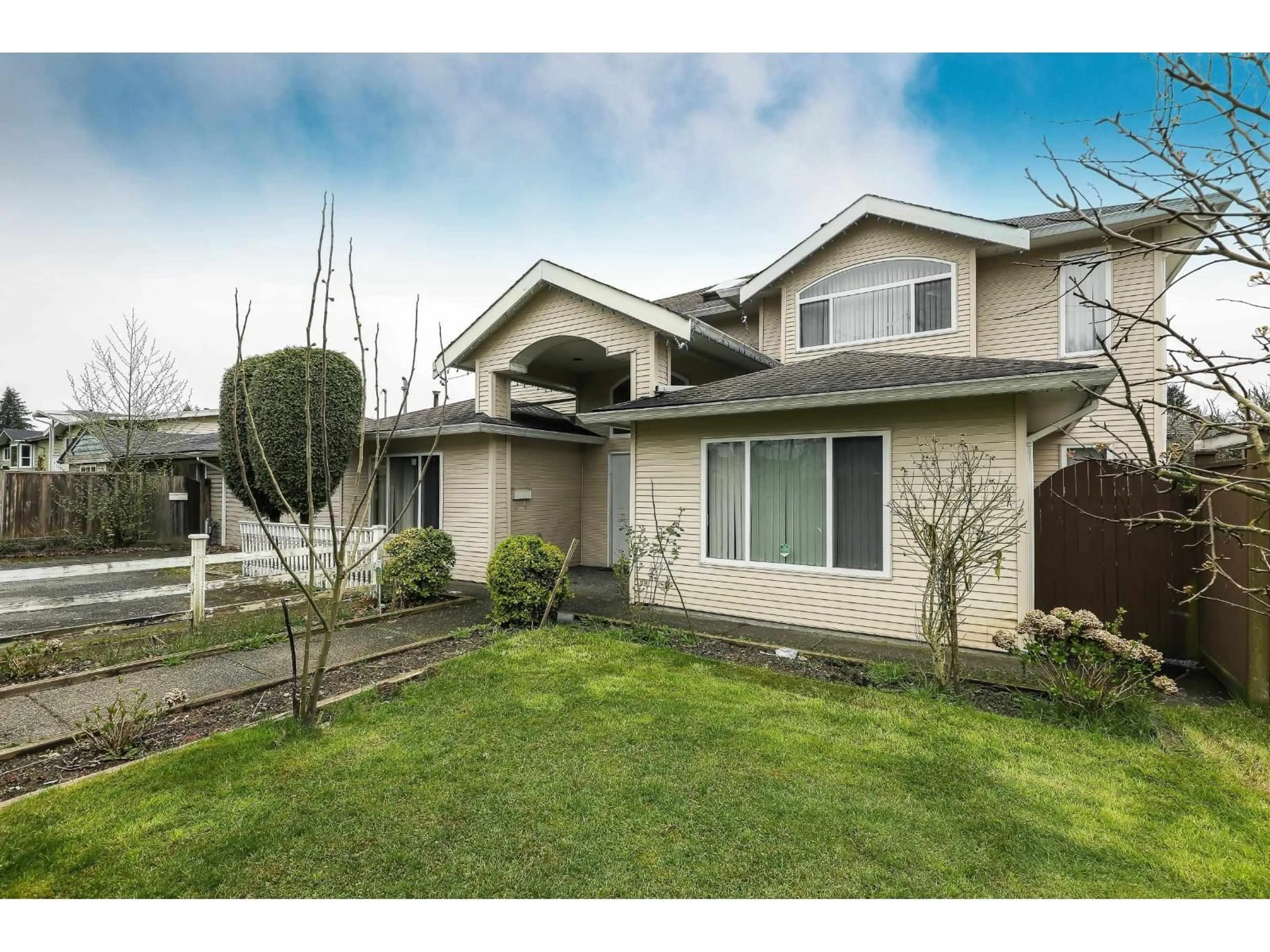Home with vinyl exterior material, street for 14076 72 AVENUE, Surrey British Columbia V1Y7P9