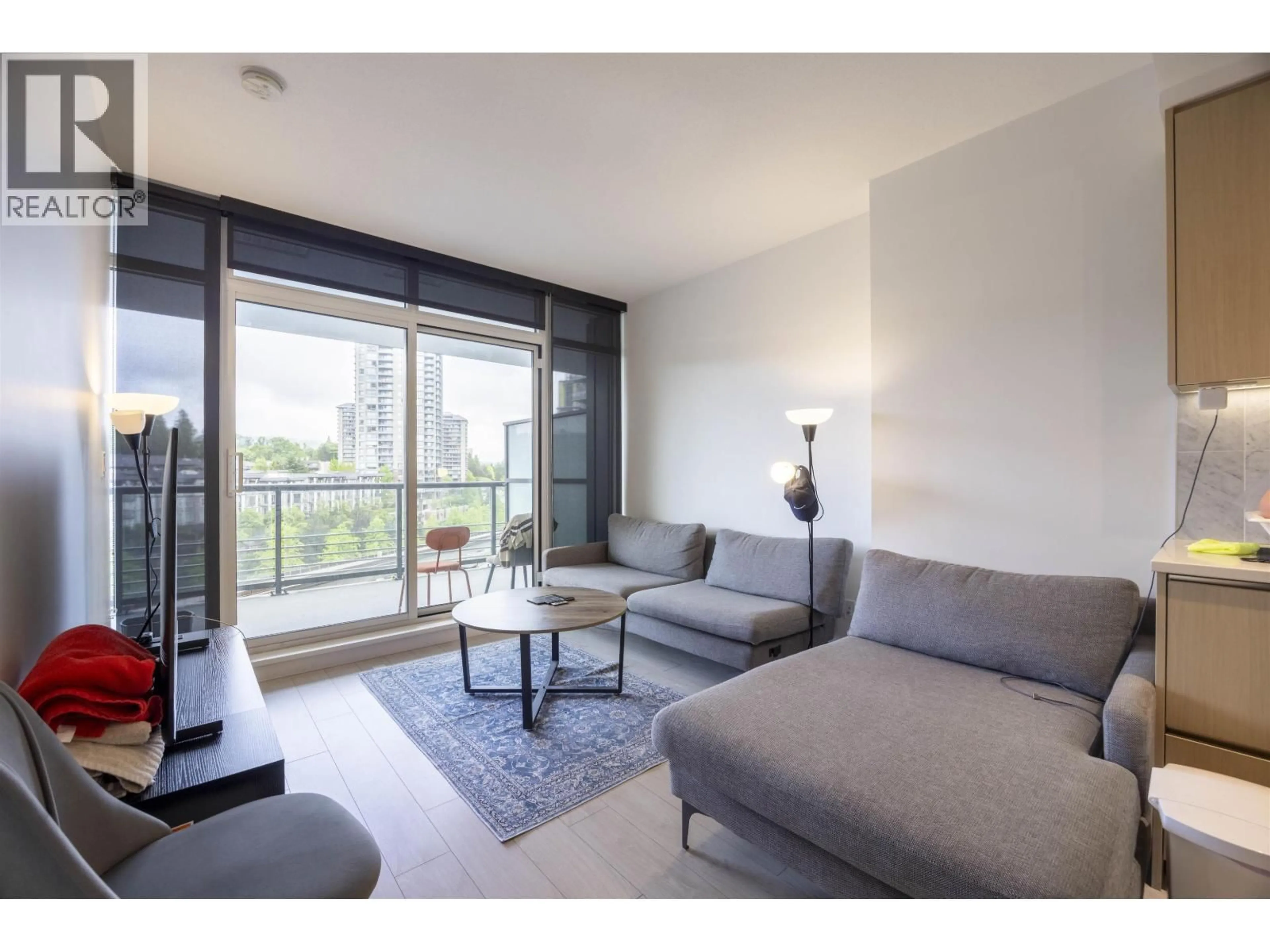 Living room with furniture, unknown for 607 - 4720 LOUGHEED HIGHWAY, Burnaby British Columbia V5C0M8