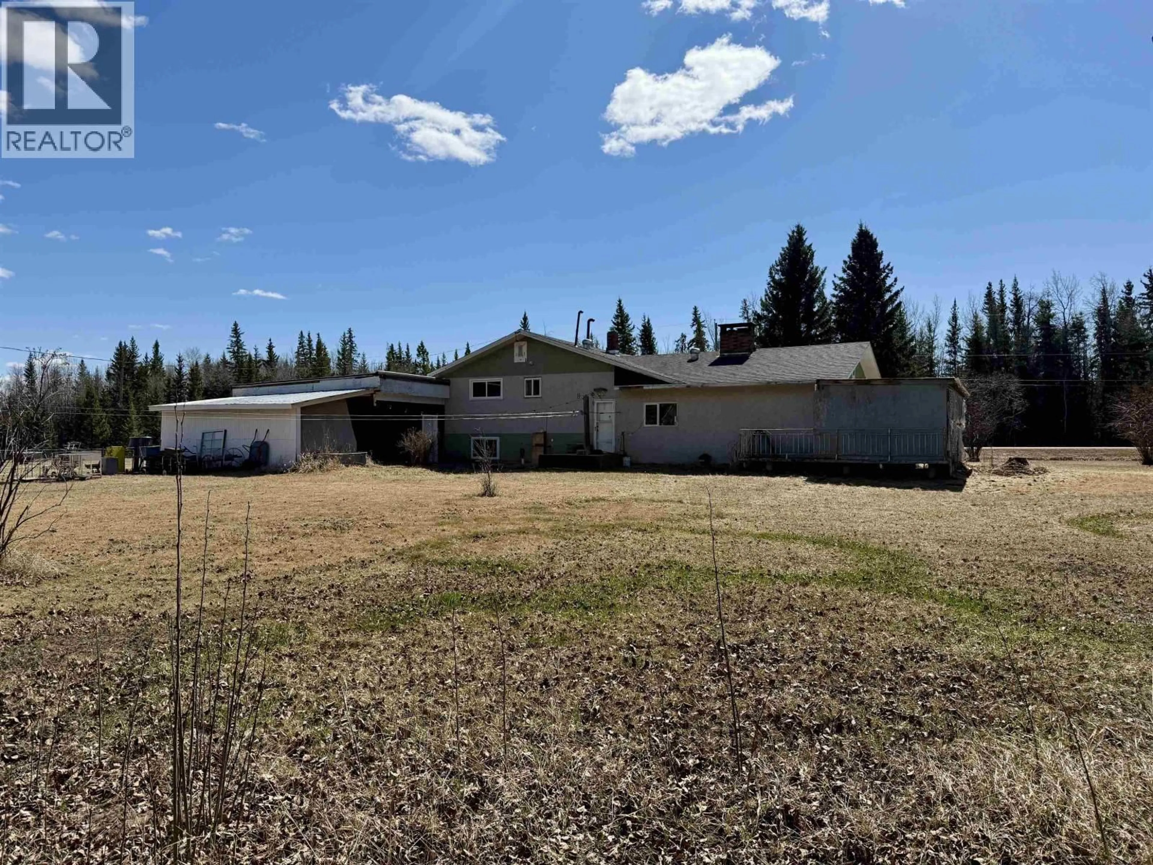 A pic from outside/outdoor area/front of a property/back of a property/a pic from drone, mountain view for 731 NECHAKO AVENUE, Vanderhoof British Columbia V0J3A1