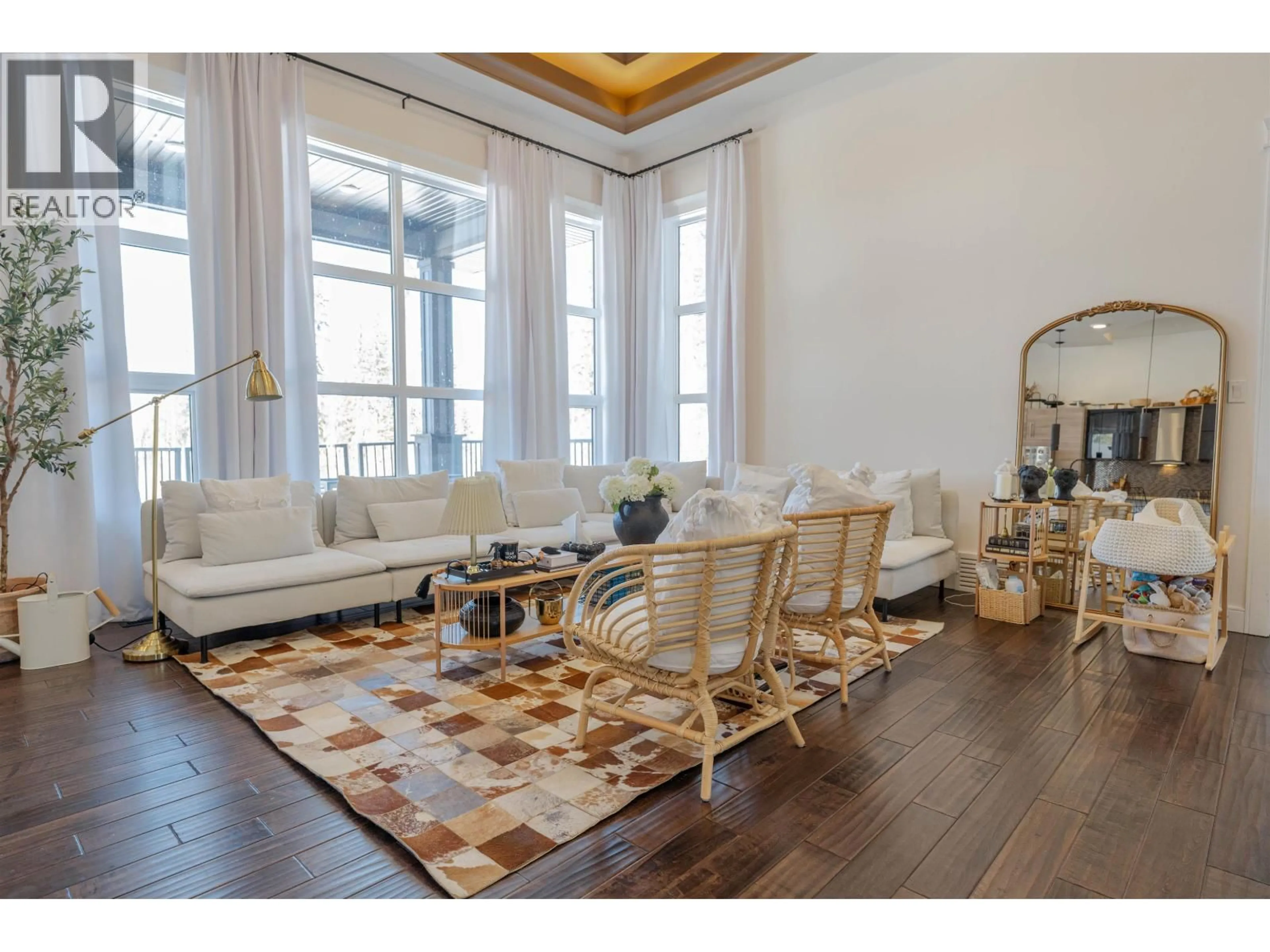 Living room with furniture, wood/laminate floor for 14586 RED CREEK ROAD, Fort St. John British Columbia V1J8L8