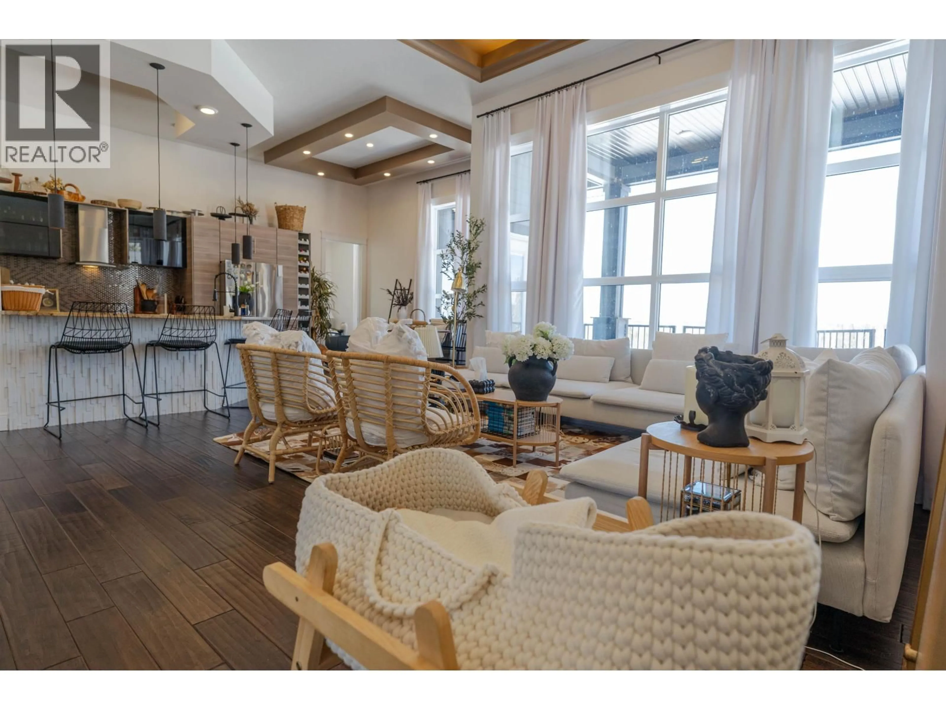 Living room with furniture, wood/laminate floor for 14586 RED CREEK ROAD, Fort St. John British Columbia V1J8L8