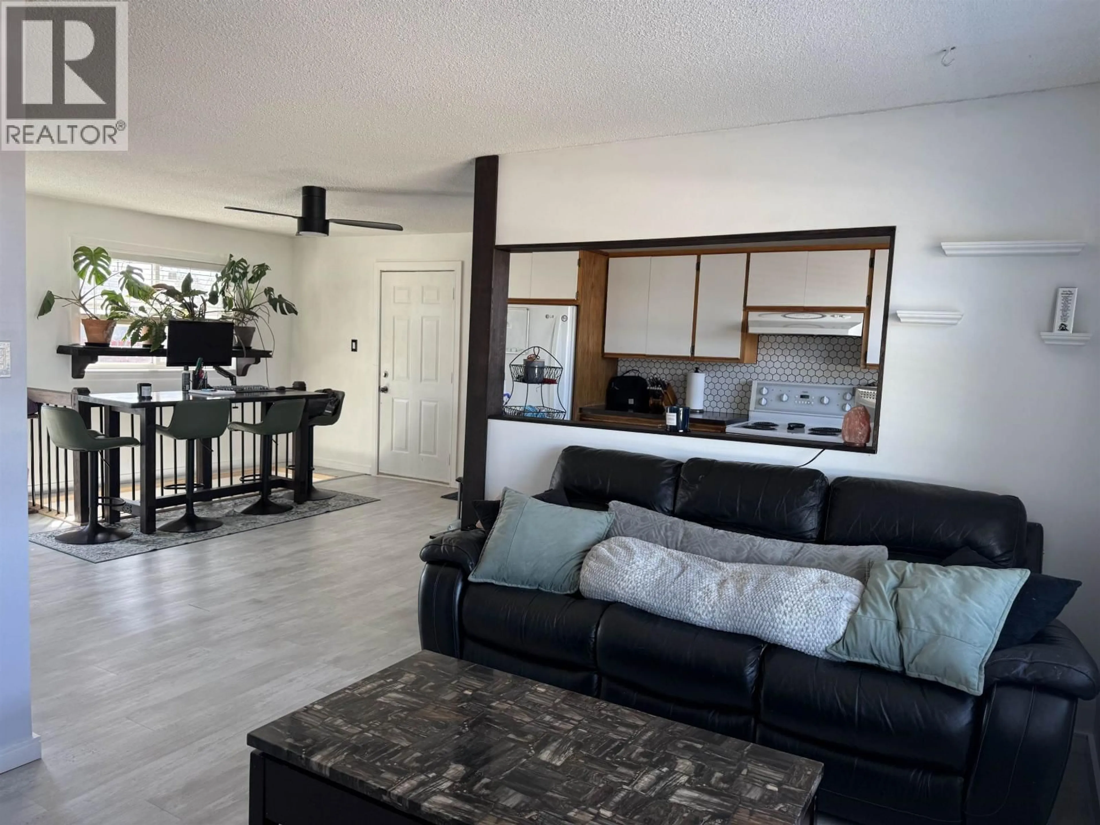 Living room with furniture, unknown for 8511 98 AVENUE, Fort St. John British Columbia V1J1P6