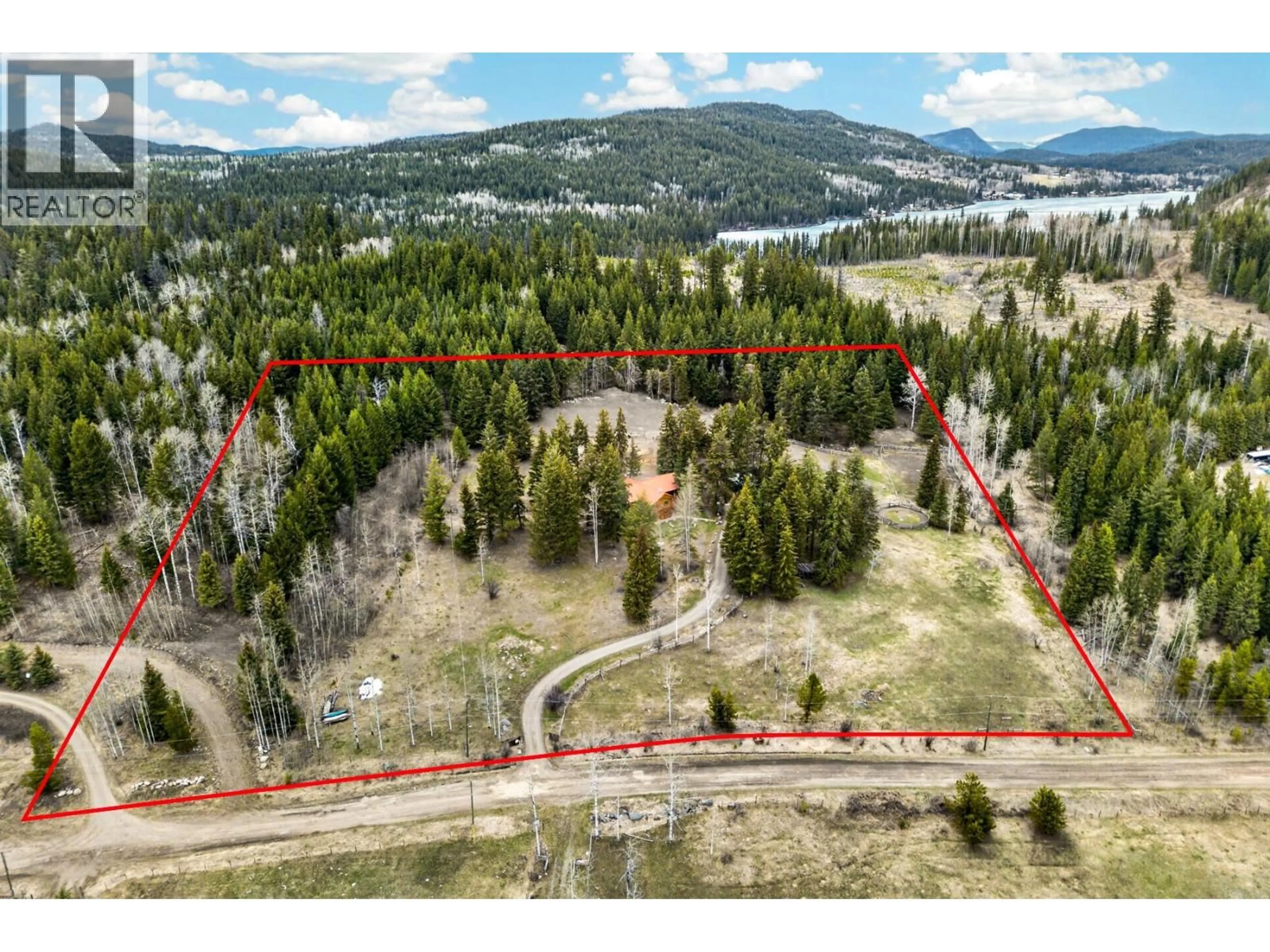 A pic from outside/outdoor area/front of a property/back of a property/a pic from drone, forest/trees view for 7471 CARIBOO CHALET ROAD, Lone Butte British Columbia V0K1X3
