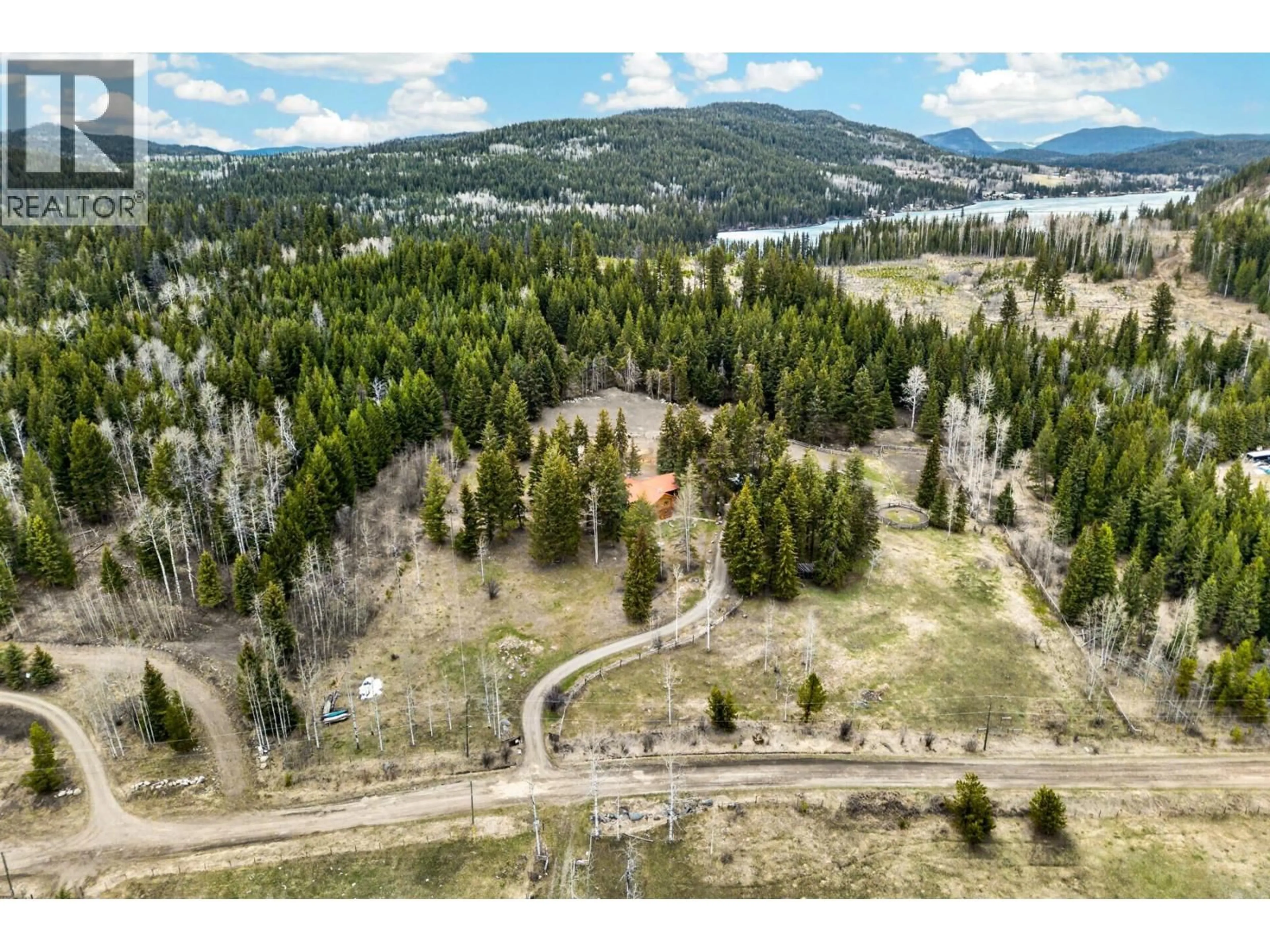 A pic from outside/outdoor area/front of a property/back of a property/a pic from drone, forest/trees view for 7471 CARIBOO CHALET ROAD, Lone Butte British Columbia V0K1X3