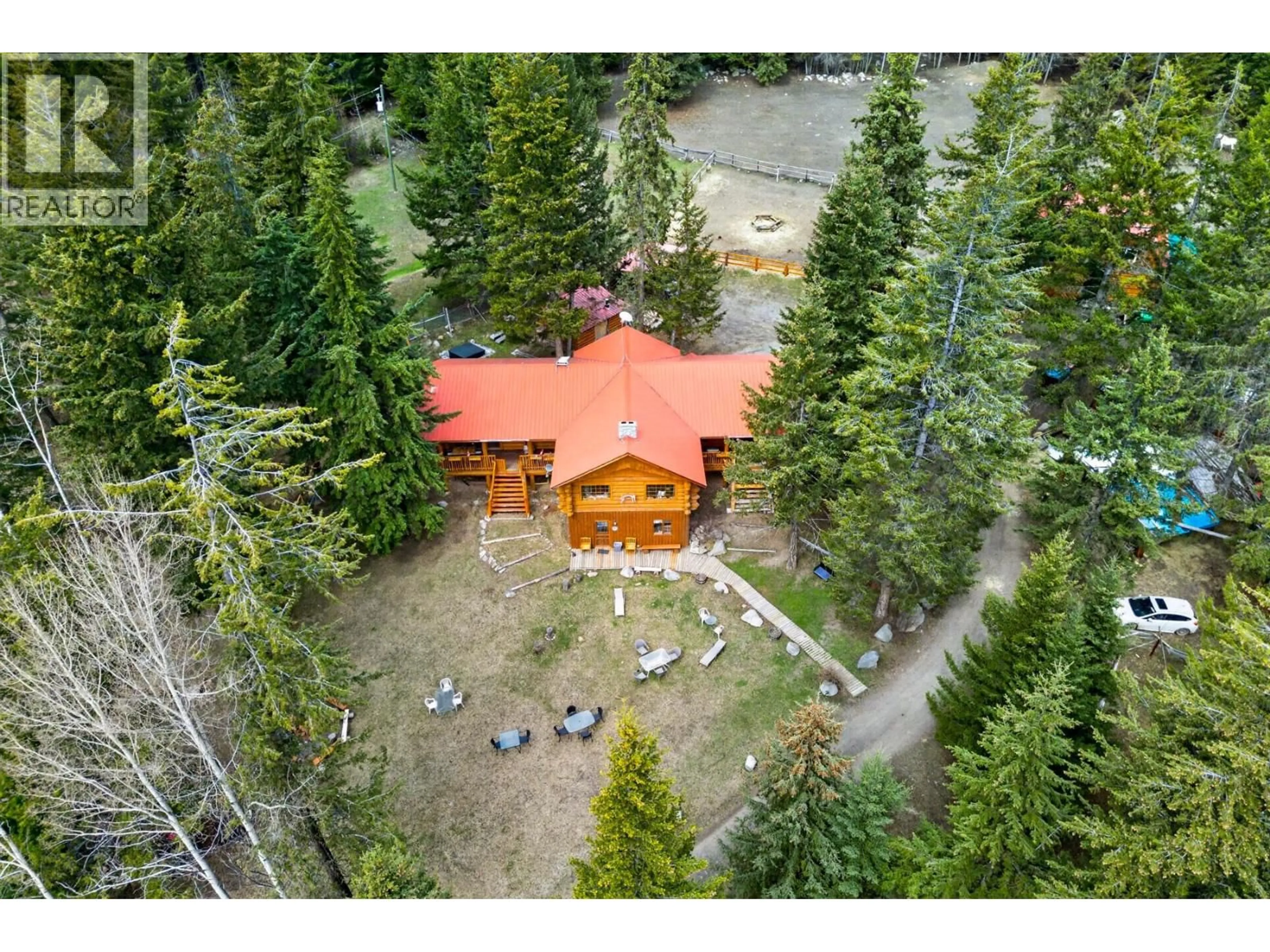 A pic from outside/outdoor area/front of a property/back of a property/a pic from drone, forest/trees view for 7471 CARIBOO CHALET ROAD, Lone Butte British Columbia V0K1X3
