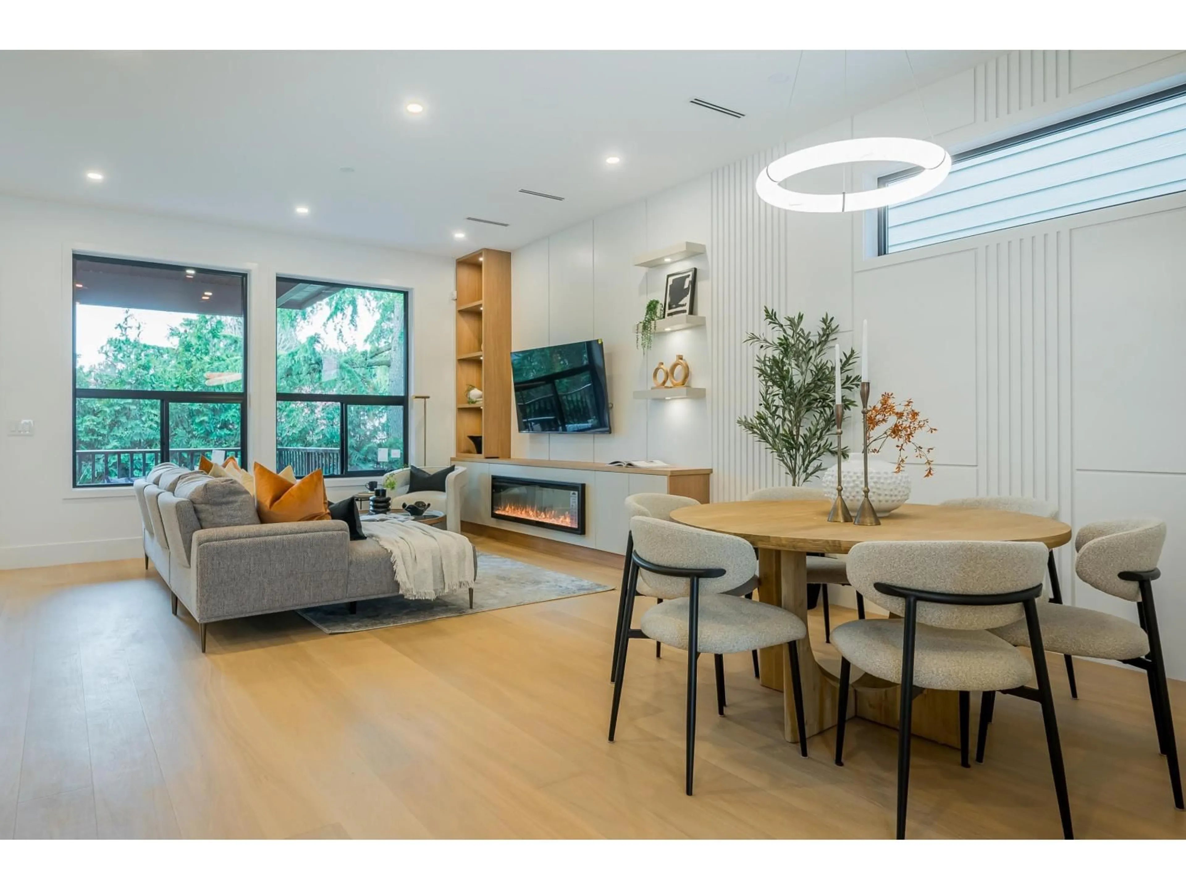 Living room with furniture, wood/laminate floor for 15648 23A AVENUE, Surrey British Columbia V0V0V0