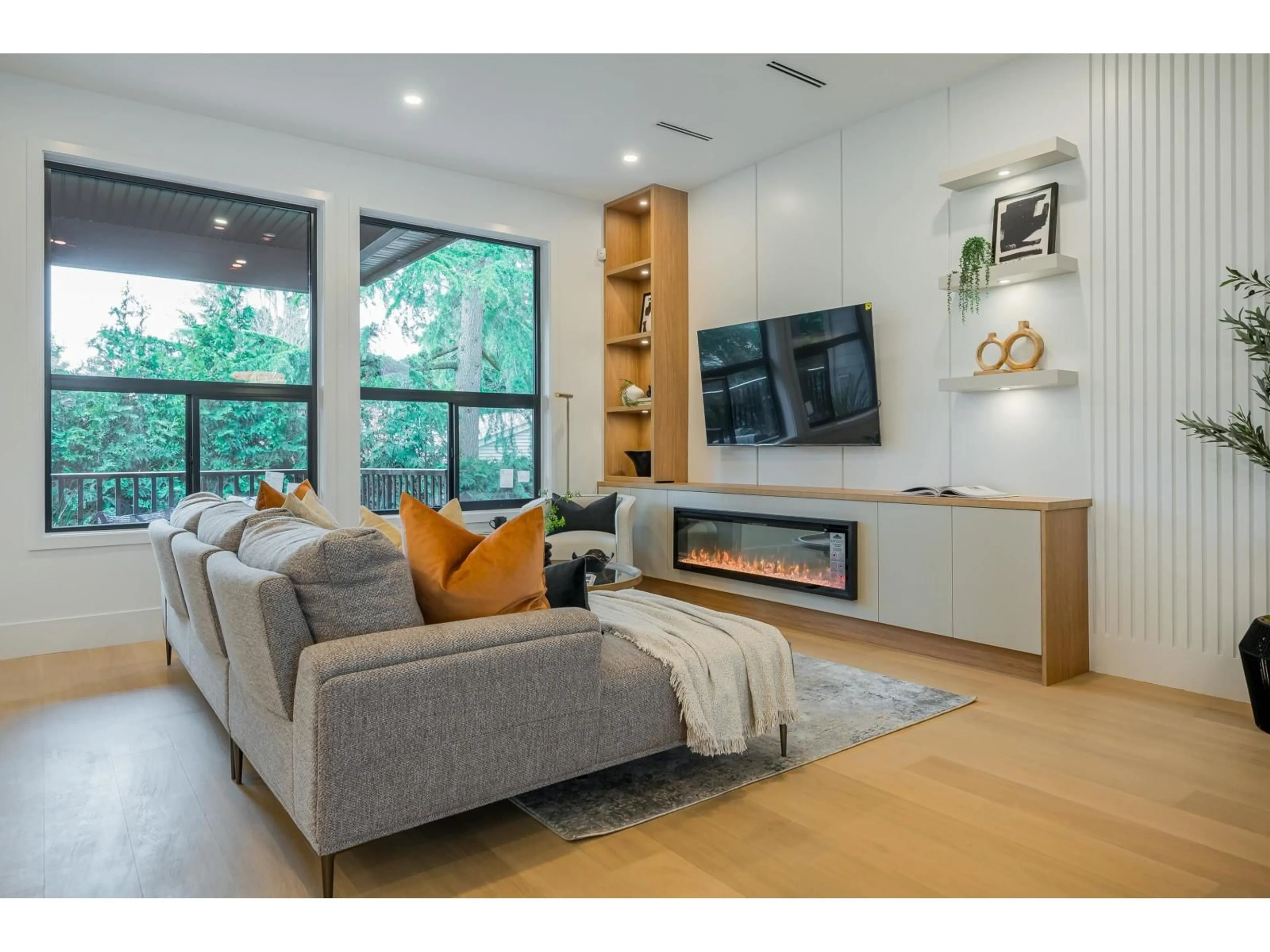 Living room with furniture, wood/laminate floor for 15648 23A AVENUE, Surrey British Columbia V0V0V0