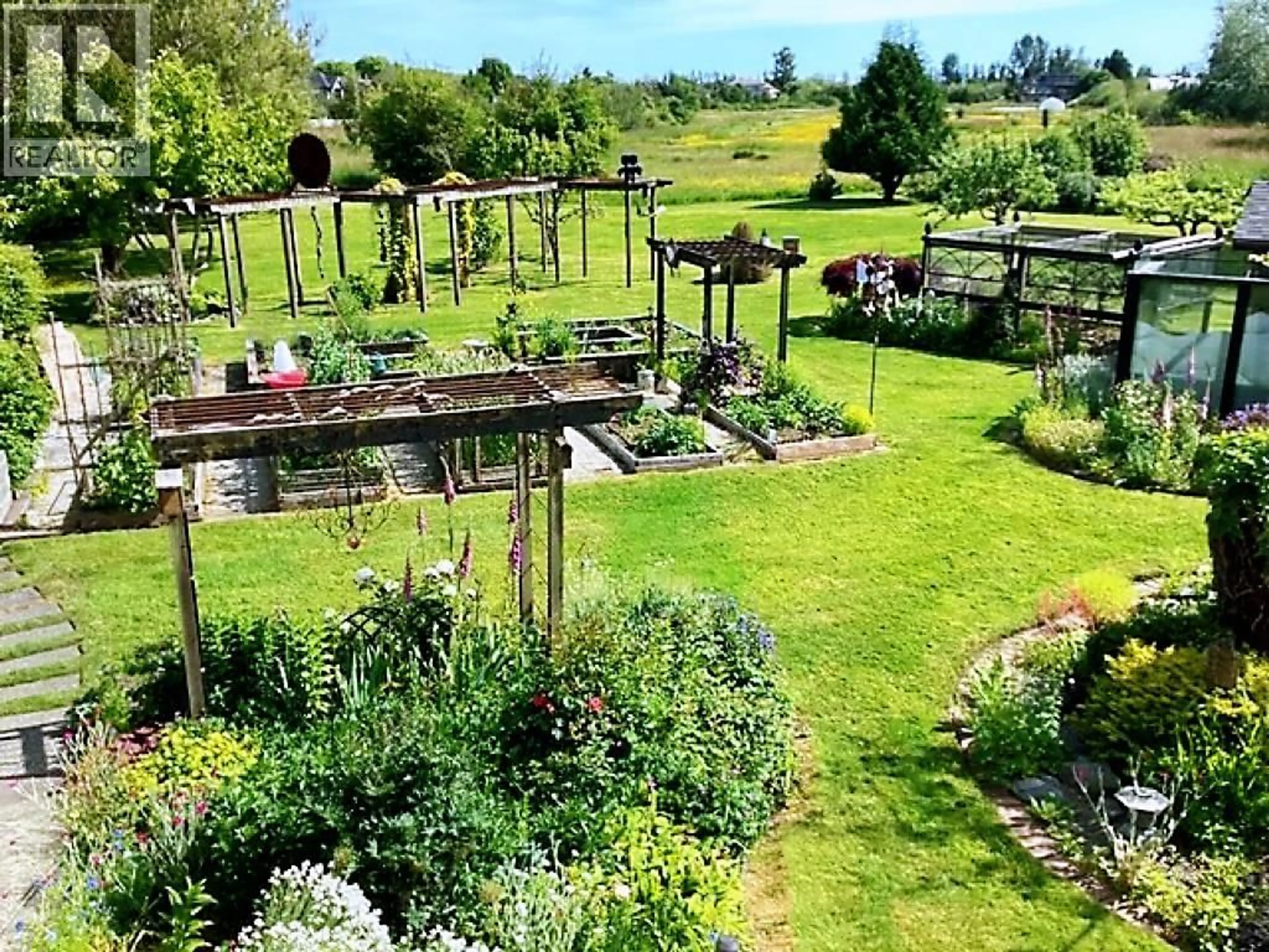 A pic from outside/outdoor area/front of a property/back of a property/a pic from drone, water/lake/river/ocean view for 2860 RIVER ROAD, Richmond British Columbia V7C1A1