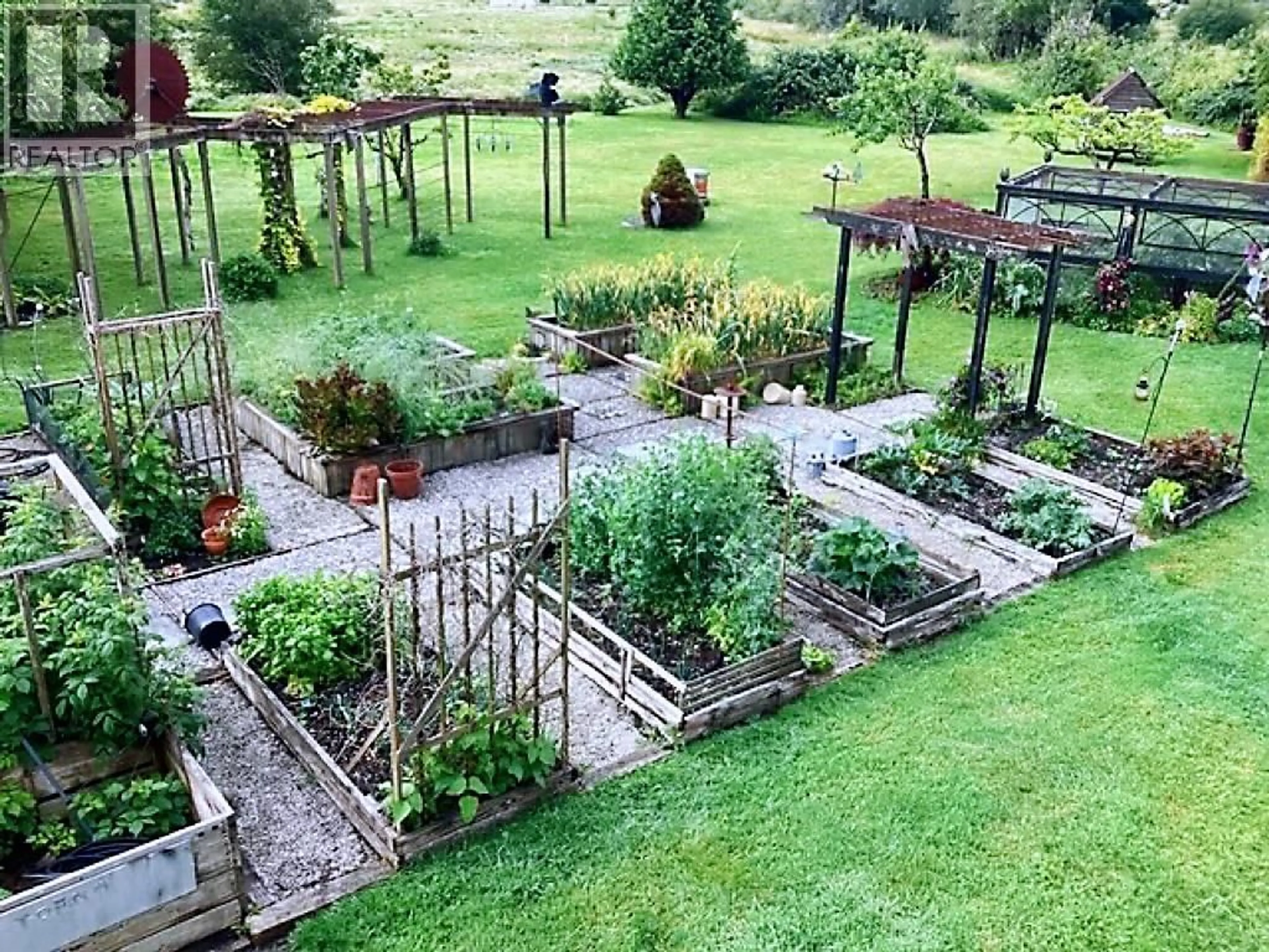 A pic from outside/outdoor area/front of a property/back of a property/a pic from drone, mountain view for 2860 RIVER ROAD, Richmond British Columbia V7C1A1