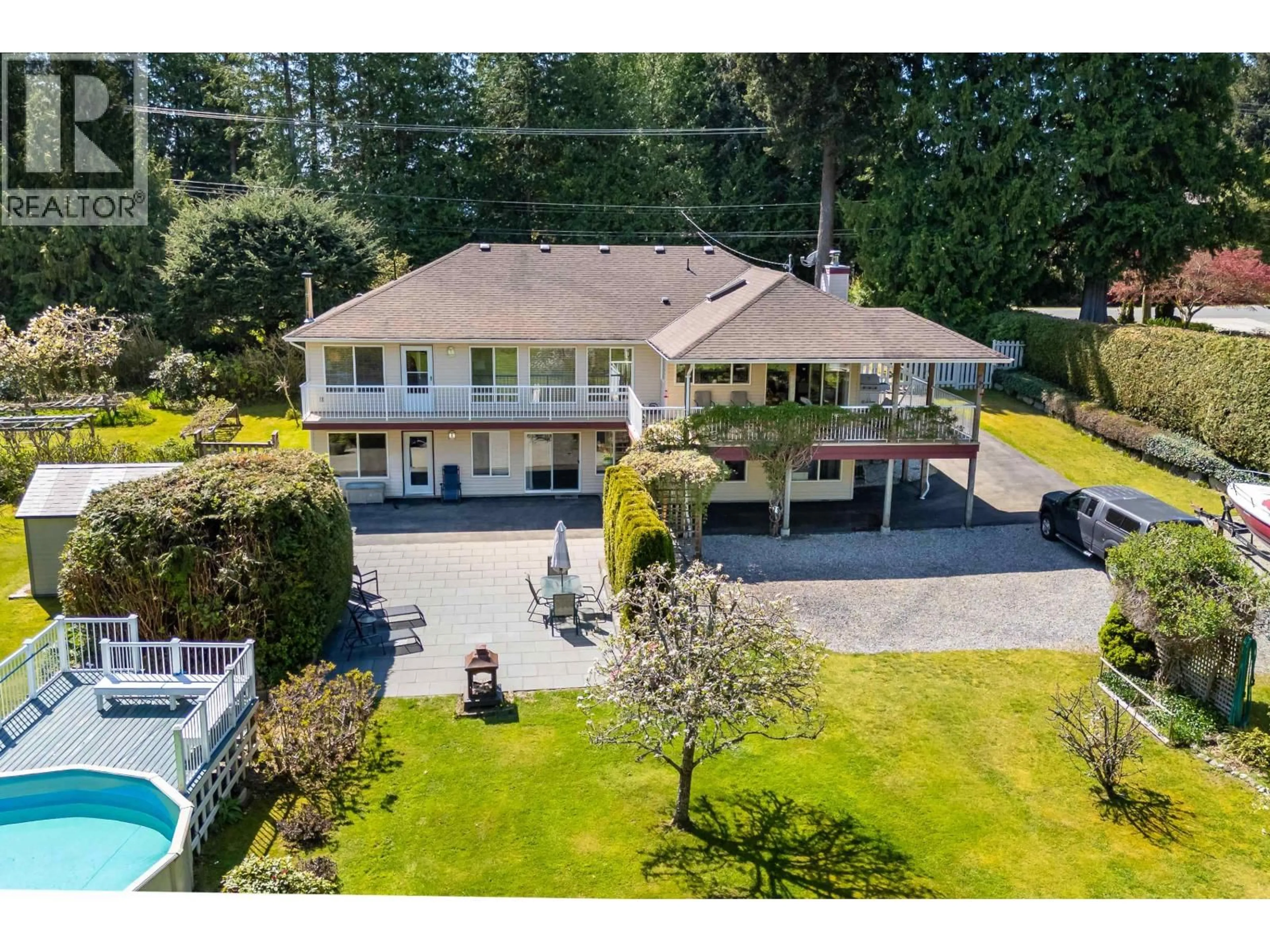 A pic from outside/outdoor area/front of a property/back of a property/a pic from drone, unknown for 7904 REDROOFFS ROAD, Halfmoon Bay British Columbia V7Z1A4