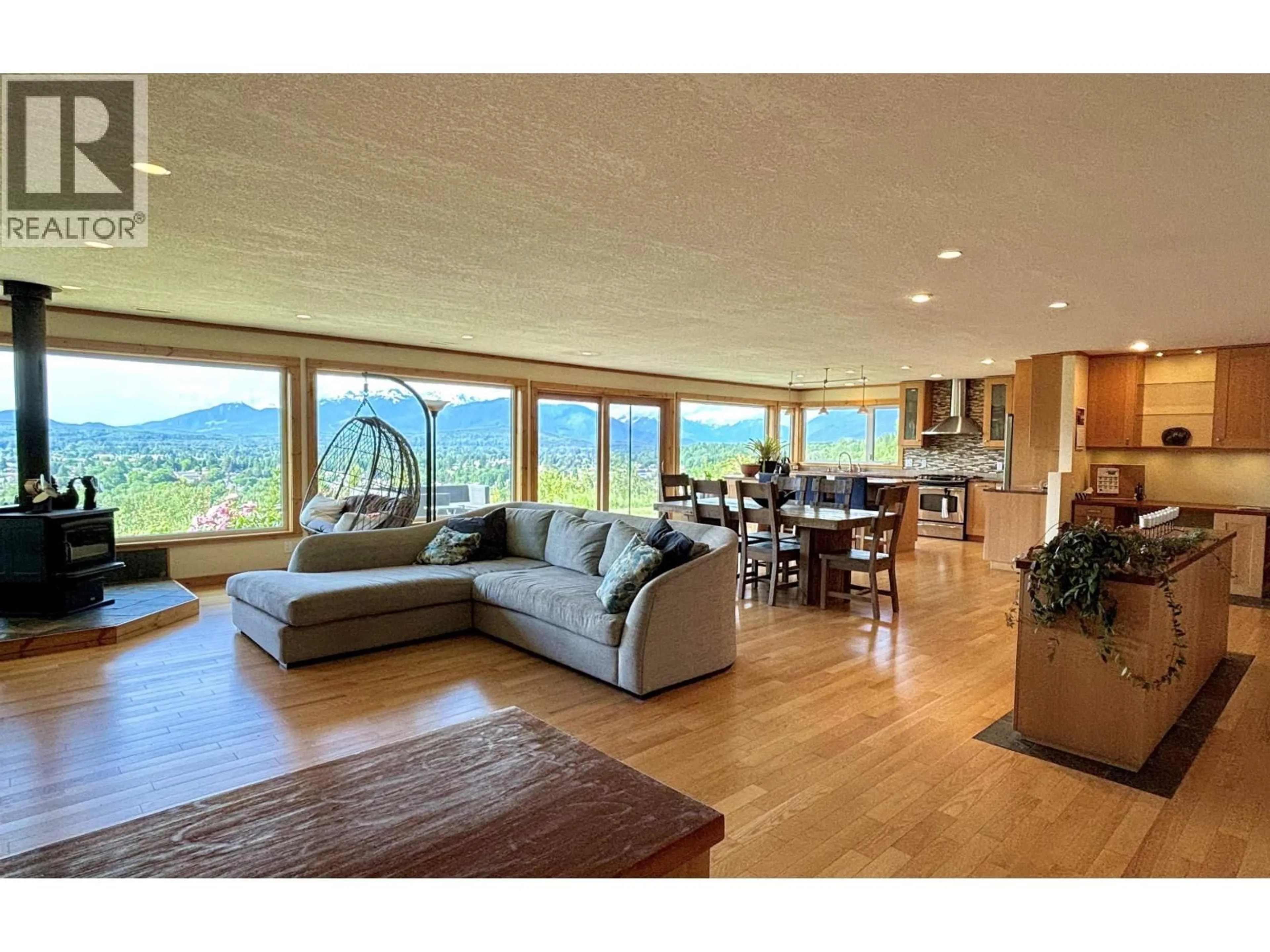 Living room with furniture, wood/laminate floor for 4022 SKOGLUND STREET, Terrace British Columbia V8G2W9