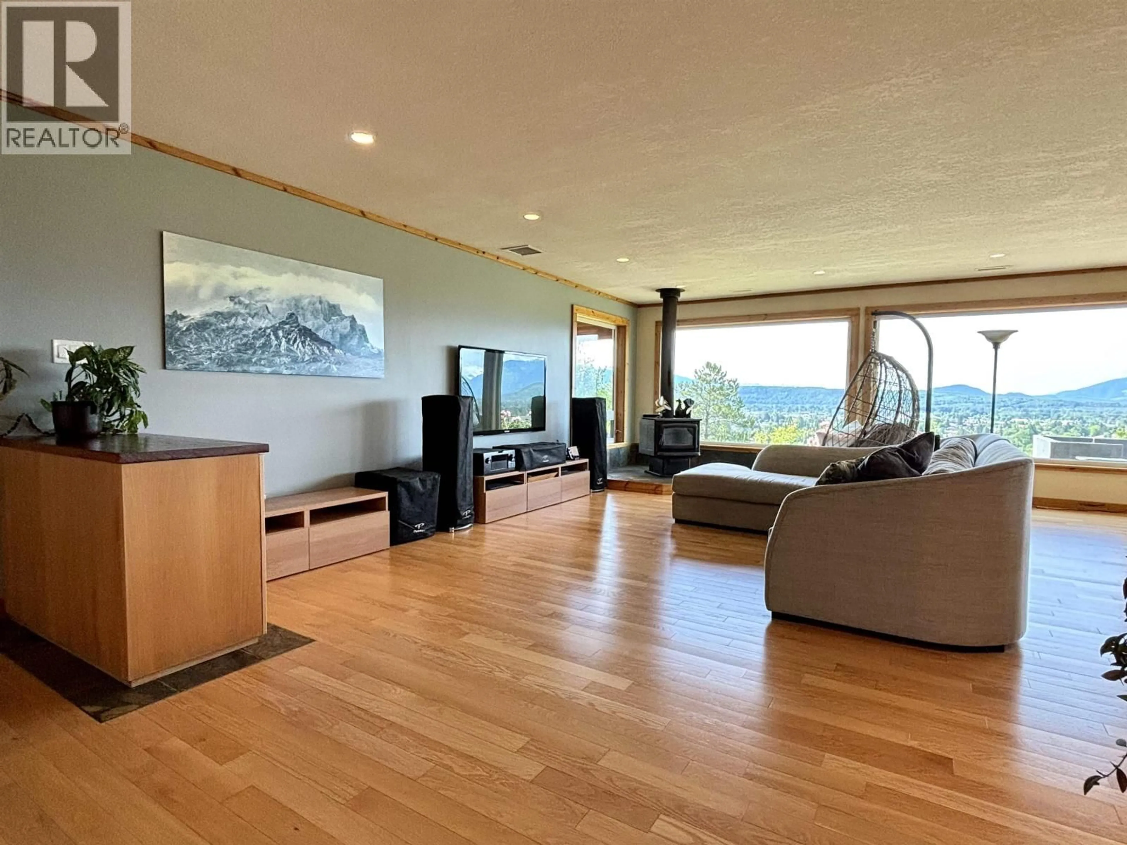 Living room with furniture, wood/laminate floor for 4022 SKOGLUND STREET, Terrace British Columbia V8G2W9