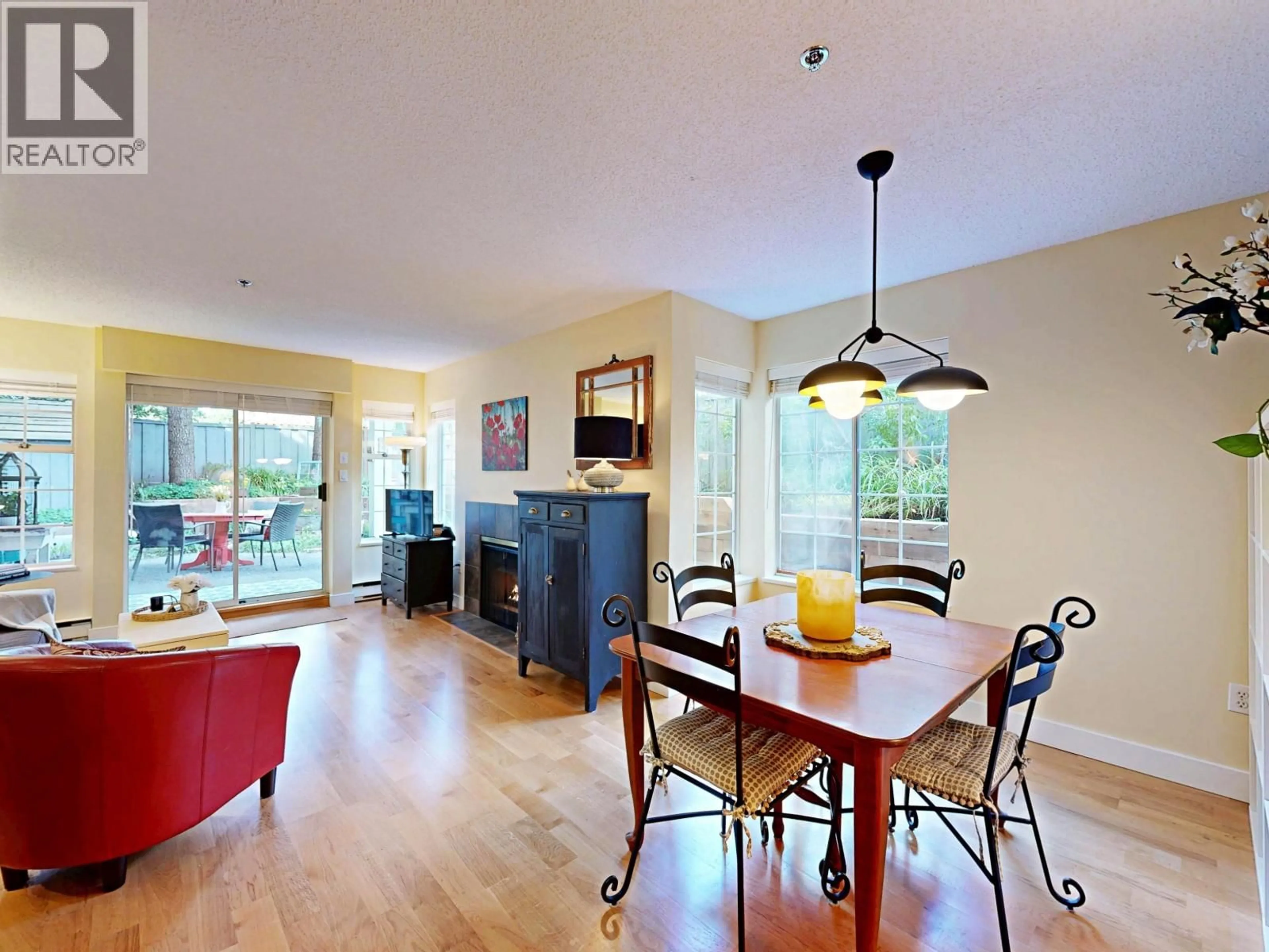 Dining room, wood/laminate floor for 103 - 735 15 AVENUE, Vancouver British Columbia V5Z1R6