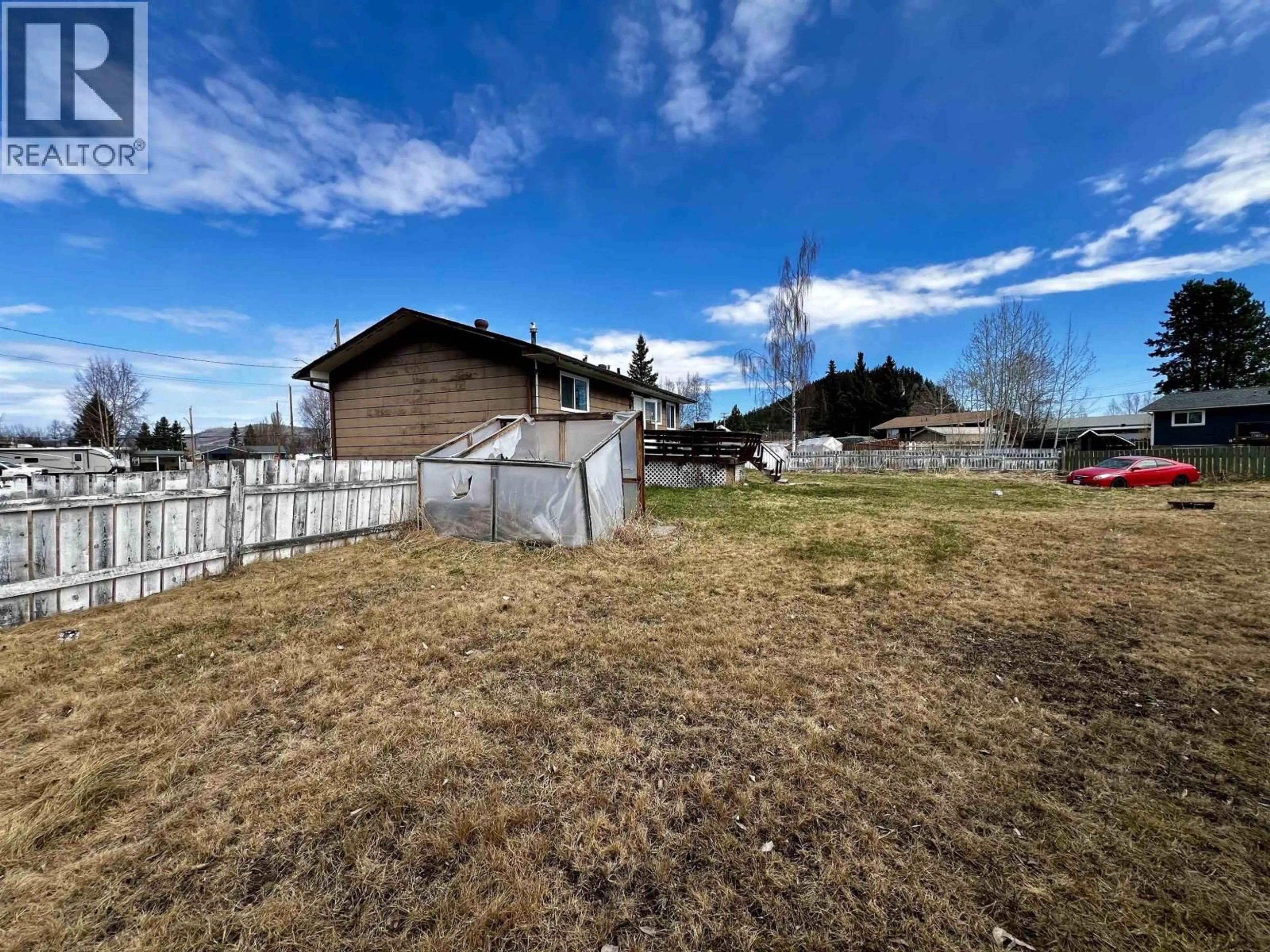 A pic from outside/outdoor area/front of a property/back of a property/a pic from drone, mountain view for 426 ENDAKO PLACE, Fraser Lake British Columbia V0J1S0