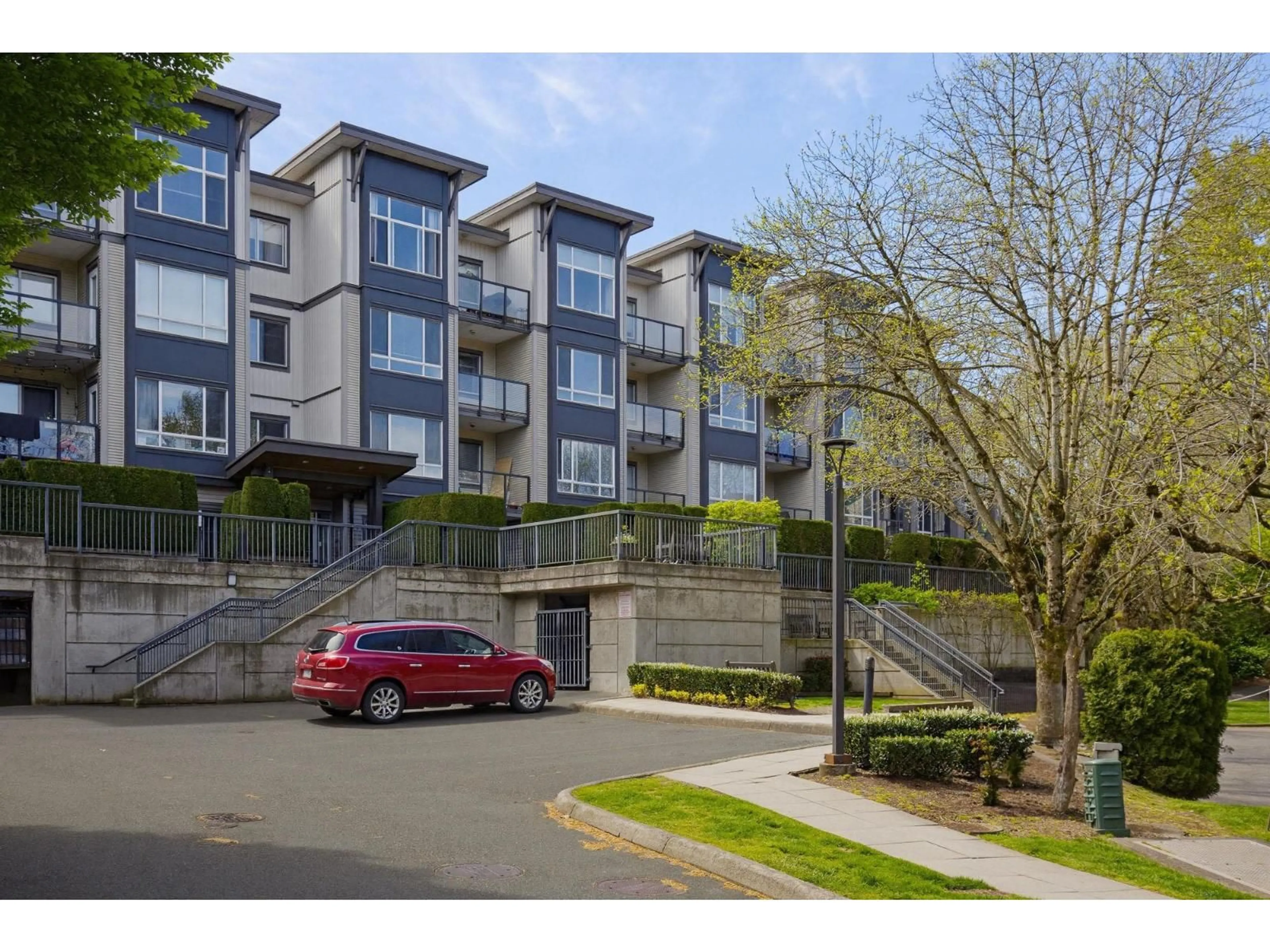 A pic from outside/outdoor area/front of a property/back of a property/a pic from drone, street for 208 - 2943 NELSON PLACE, Abbotsford British Columbia V2S0C8