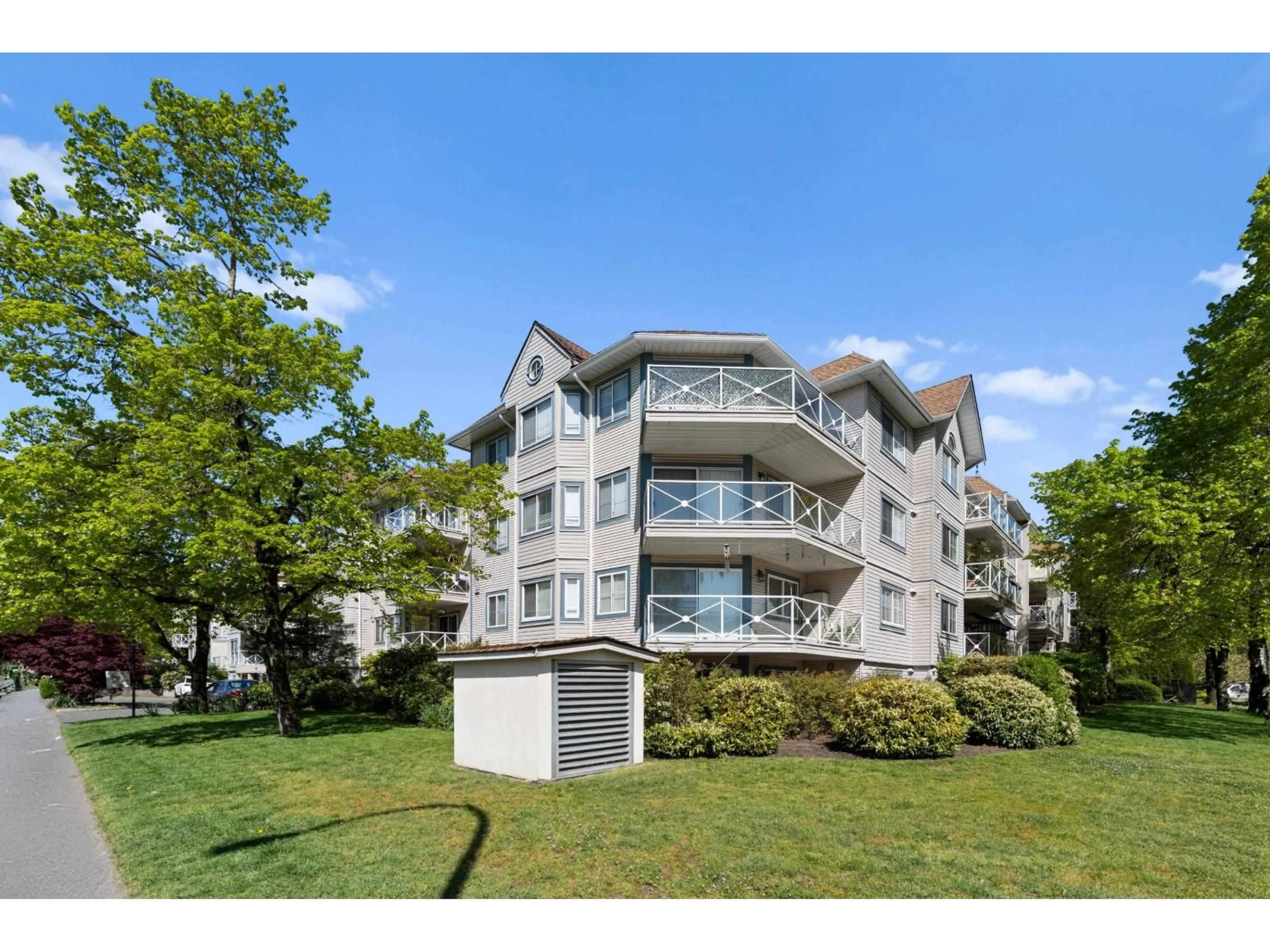 A pic from outside/outdoor area/front of a property/back of a property/a pic from drone, water/lake/river/ocean view for 306 - 12101 80 AVENUE, Surrey British Columbia V3W5V6