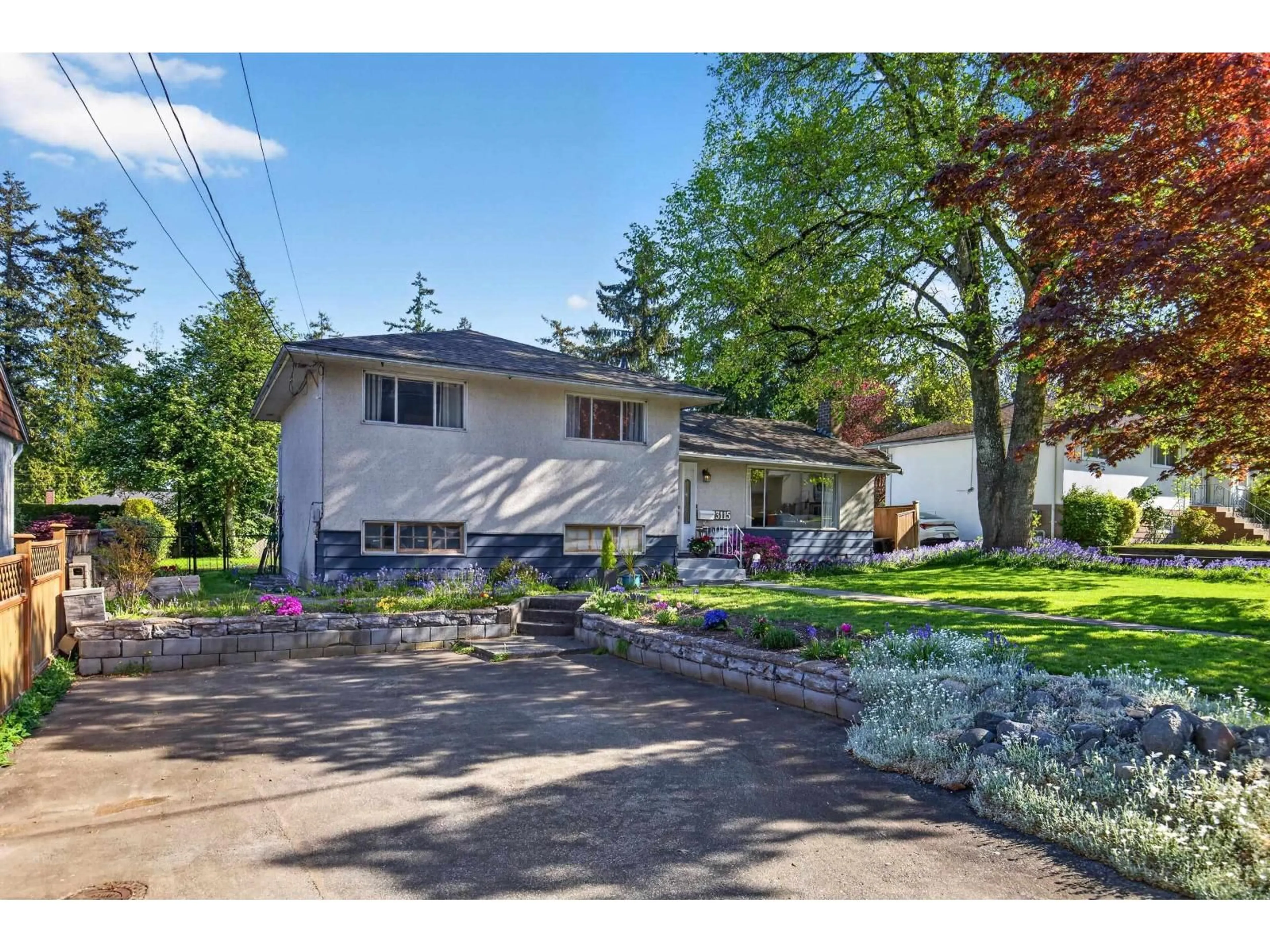 Home with vinyl exterior material, street for 13115 100A AVENUE, Surrey British Columbia V3T1K1