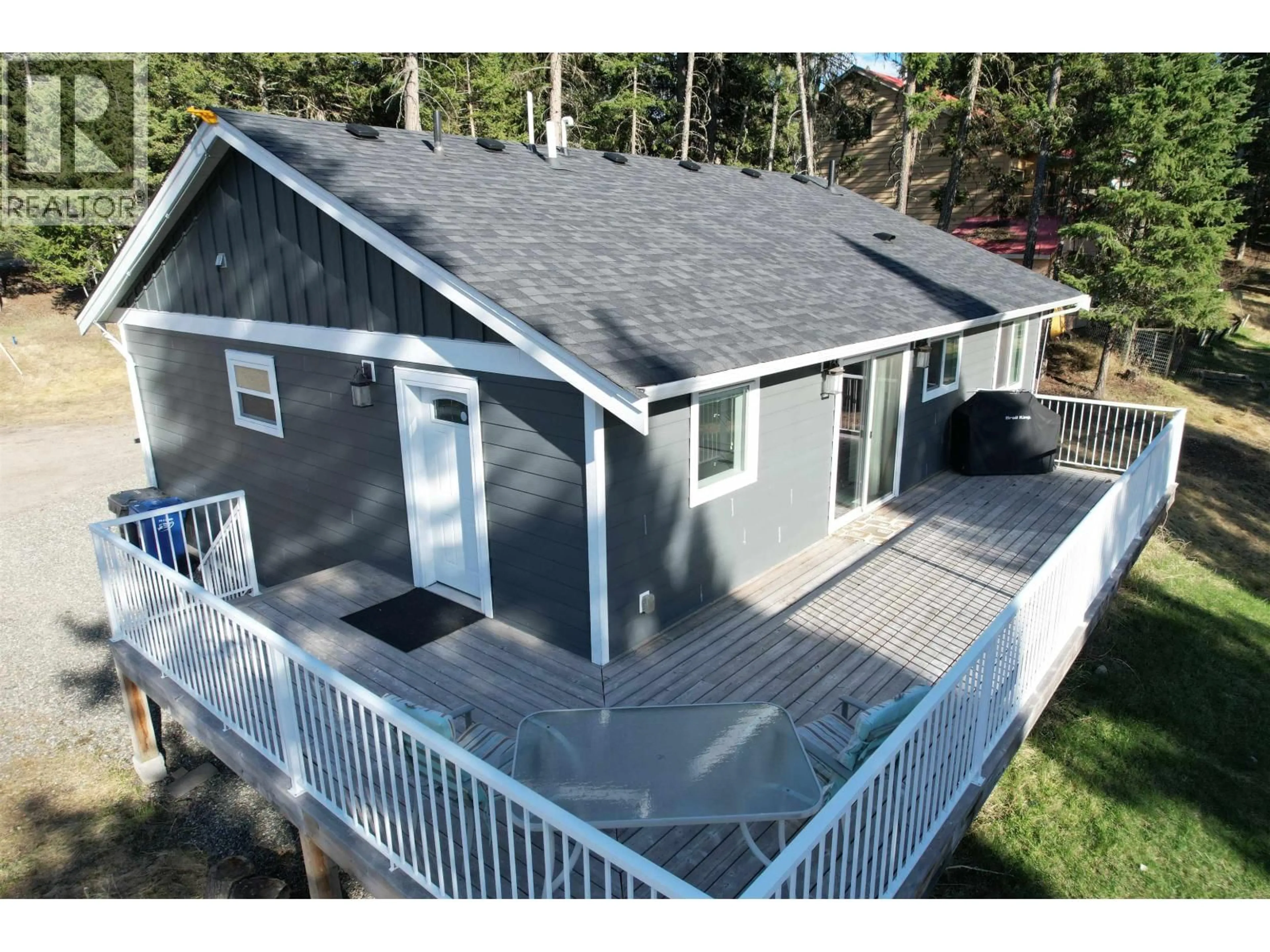 A pic from outside/outdoor area/front of a property/back of a property/a pic from drone, unknown for 4942 KYLLO ROAD, 108 Mile Ranch British Columbia V0K2Z0