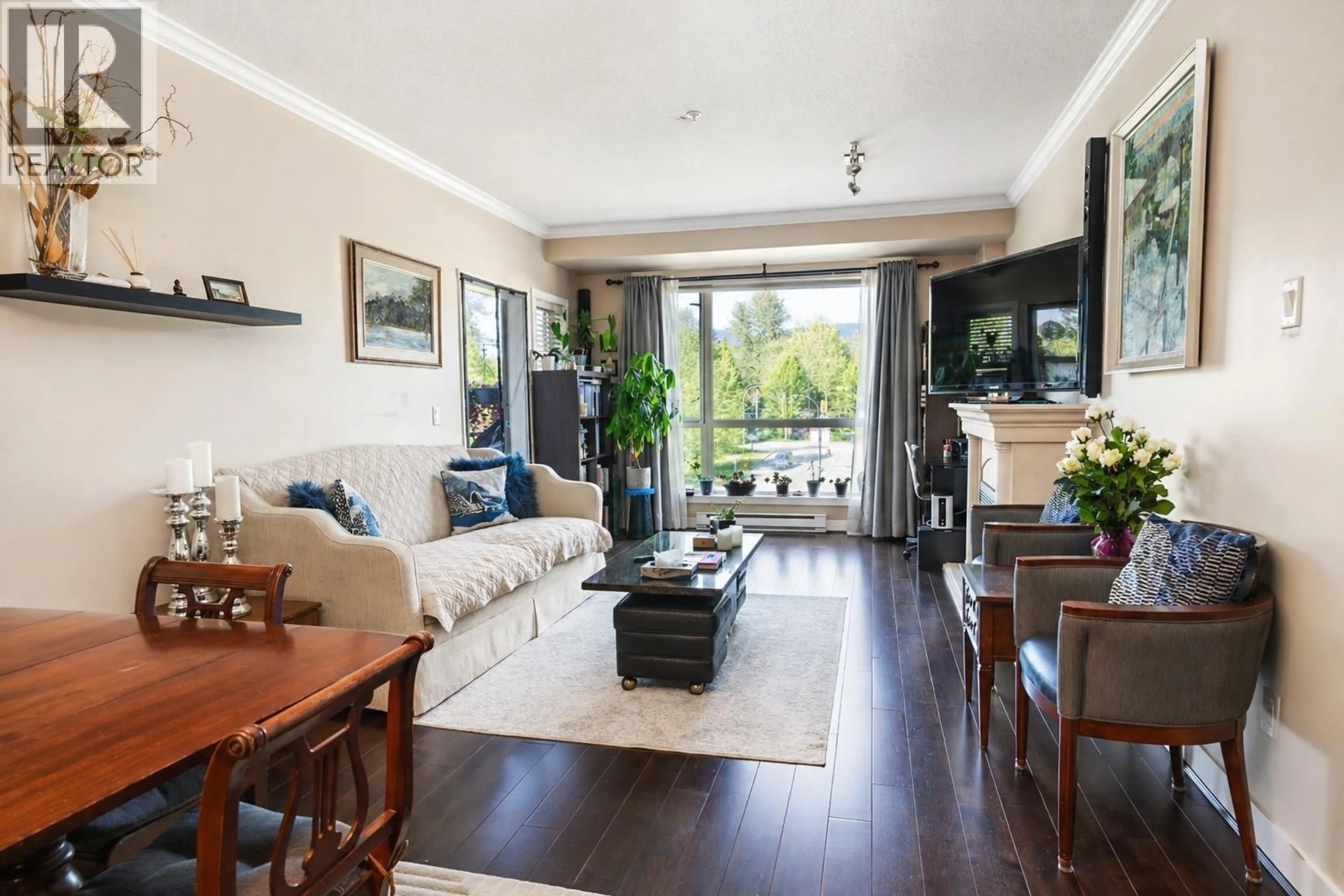 Living room with furniture, wood/laminate floor for 314 - 2628 MAPLE STREET, Port Coquitlam British Columbia V3C0E2