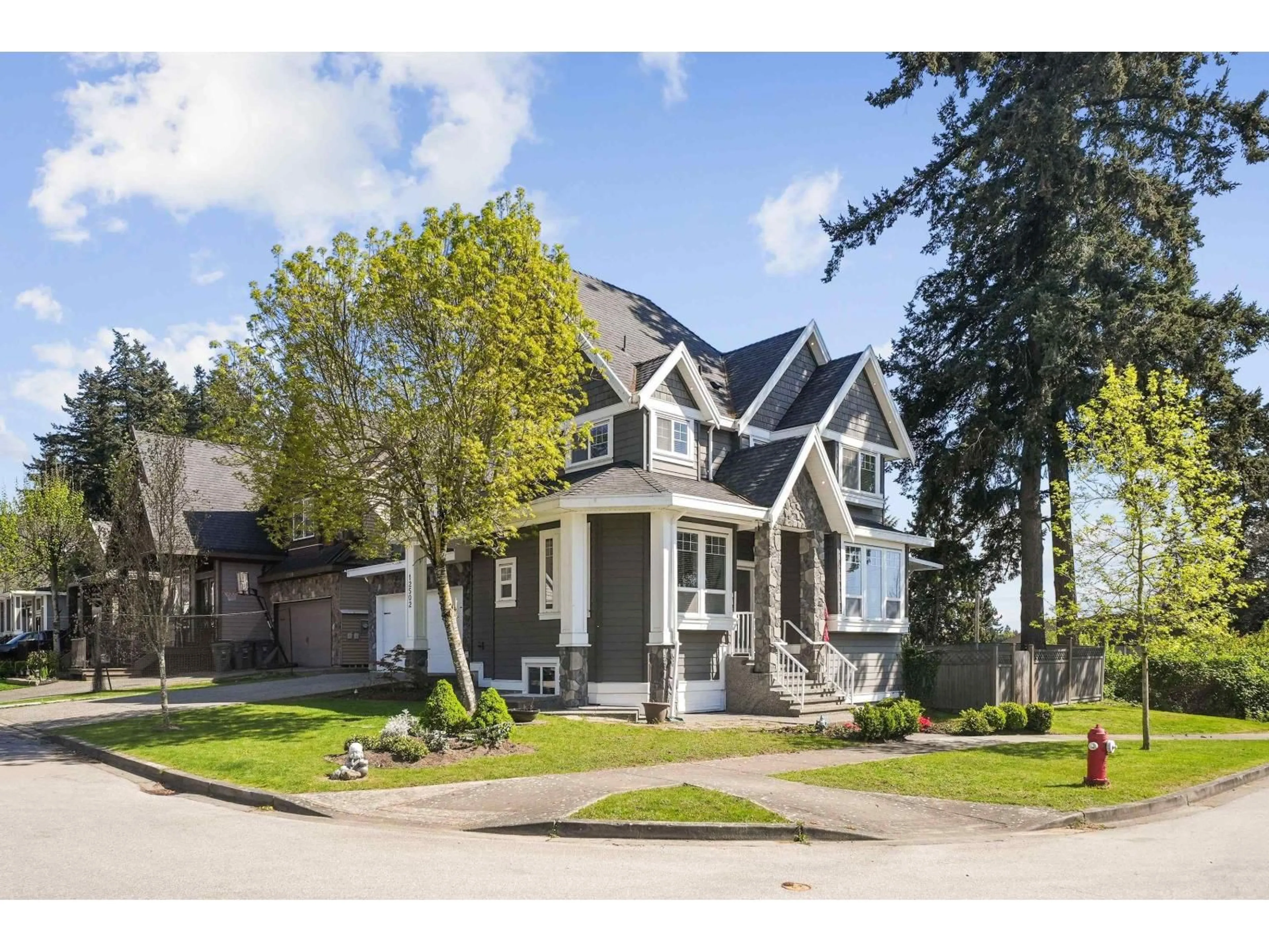 Home with vinyl exterior material, street for 12502 58A AVENUE, Surrey British Columbia V3X0E8