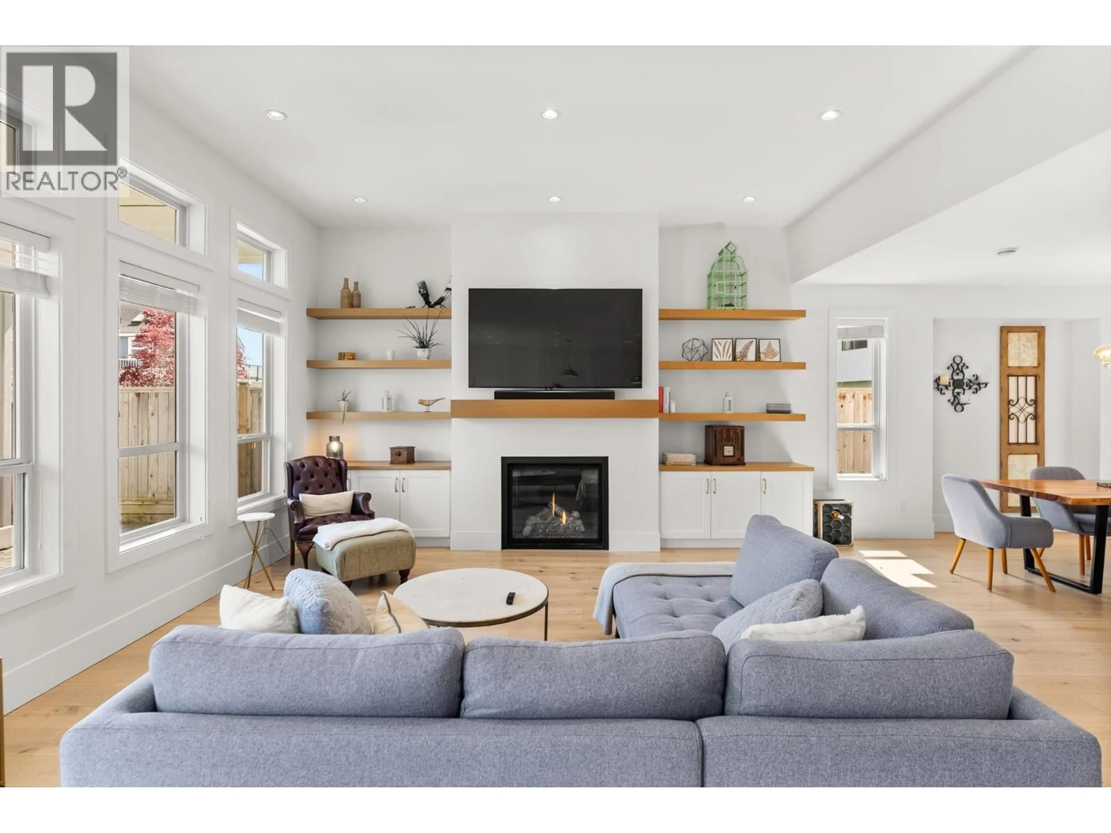 Living room with furniture, wood/laminate floor for 4410 SPANTON DRIVE, Delta British Columbia V4K2W3