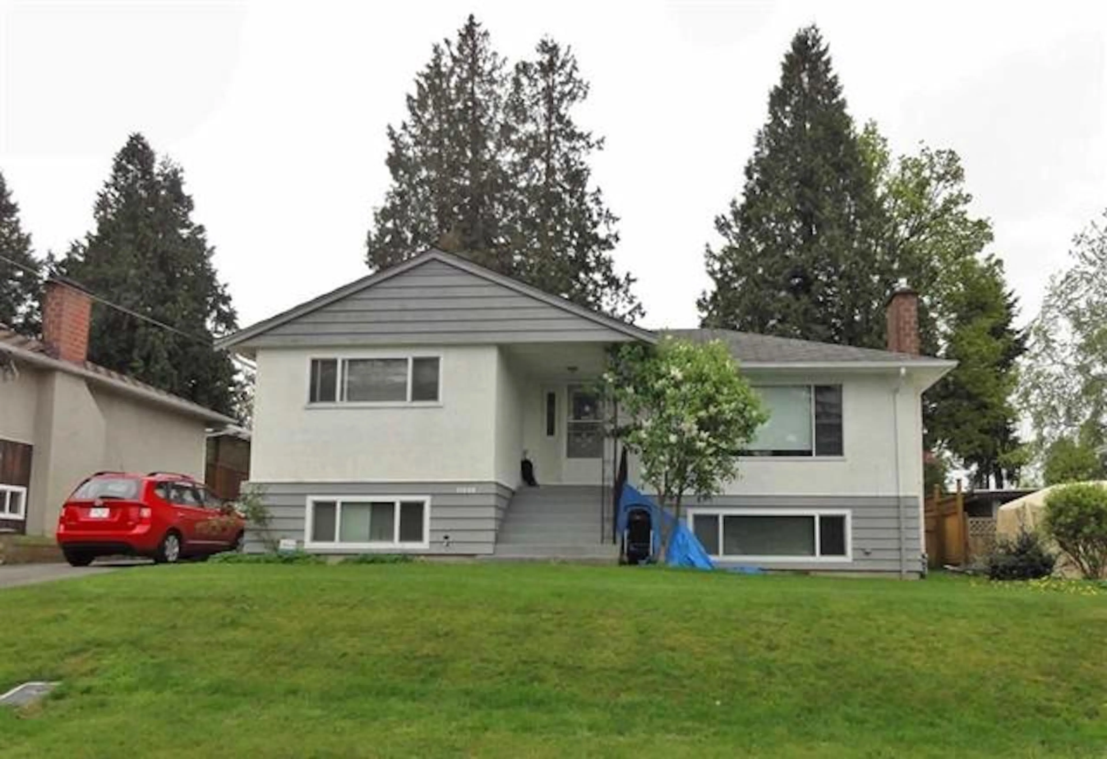 Home with vinyl exterior material, street for 11480 96A AVENUE, Surrey British Columbia V3V1Z6