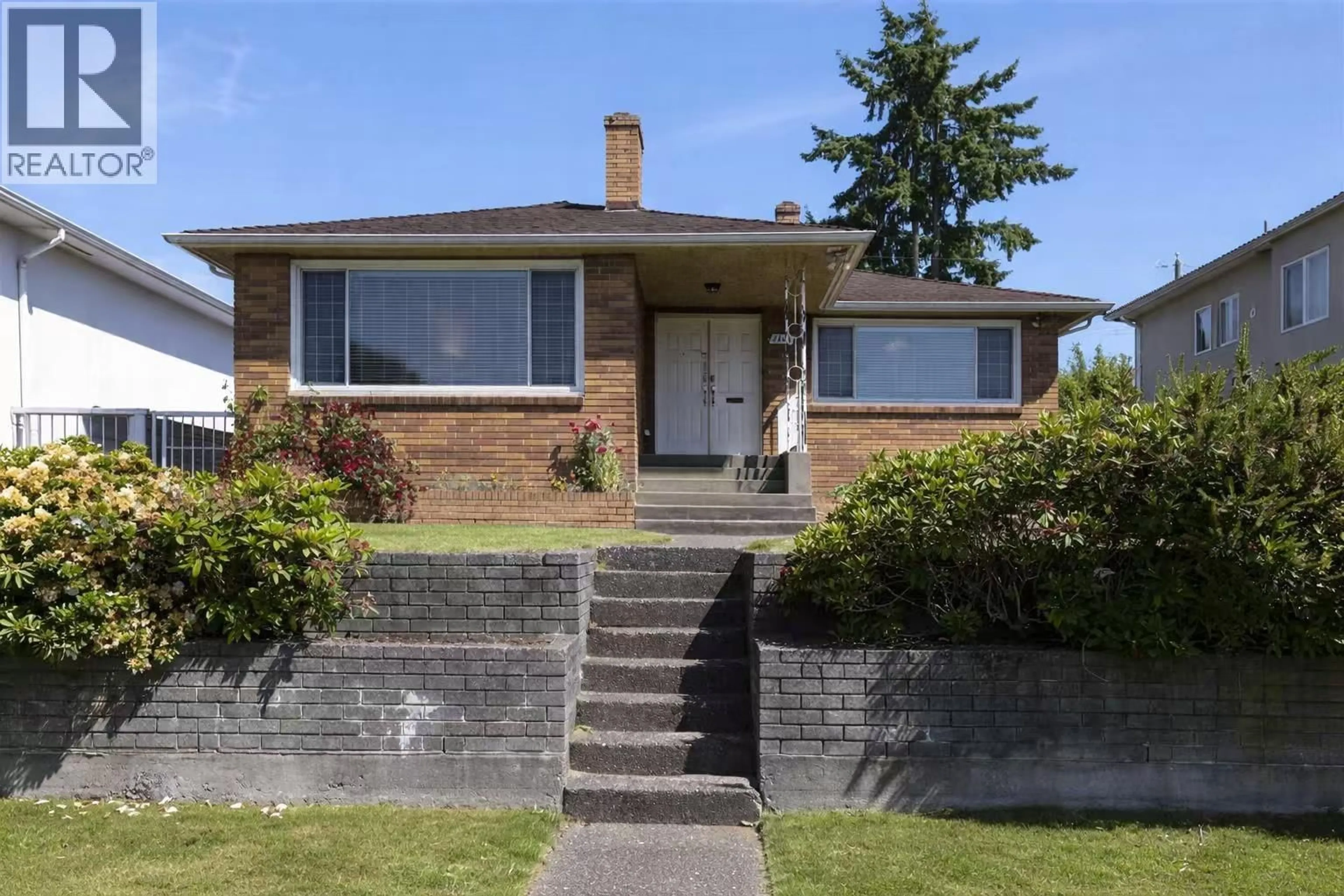 Home with brick exterior material, street for 1563 59TH AVENUE, Vancouver British Columbia V5P2G8