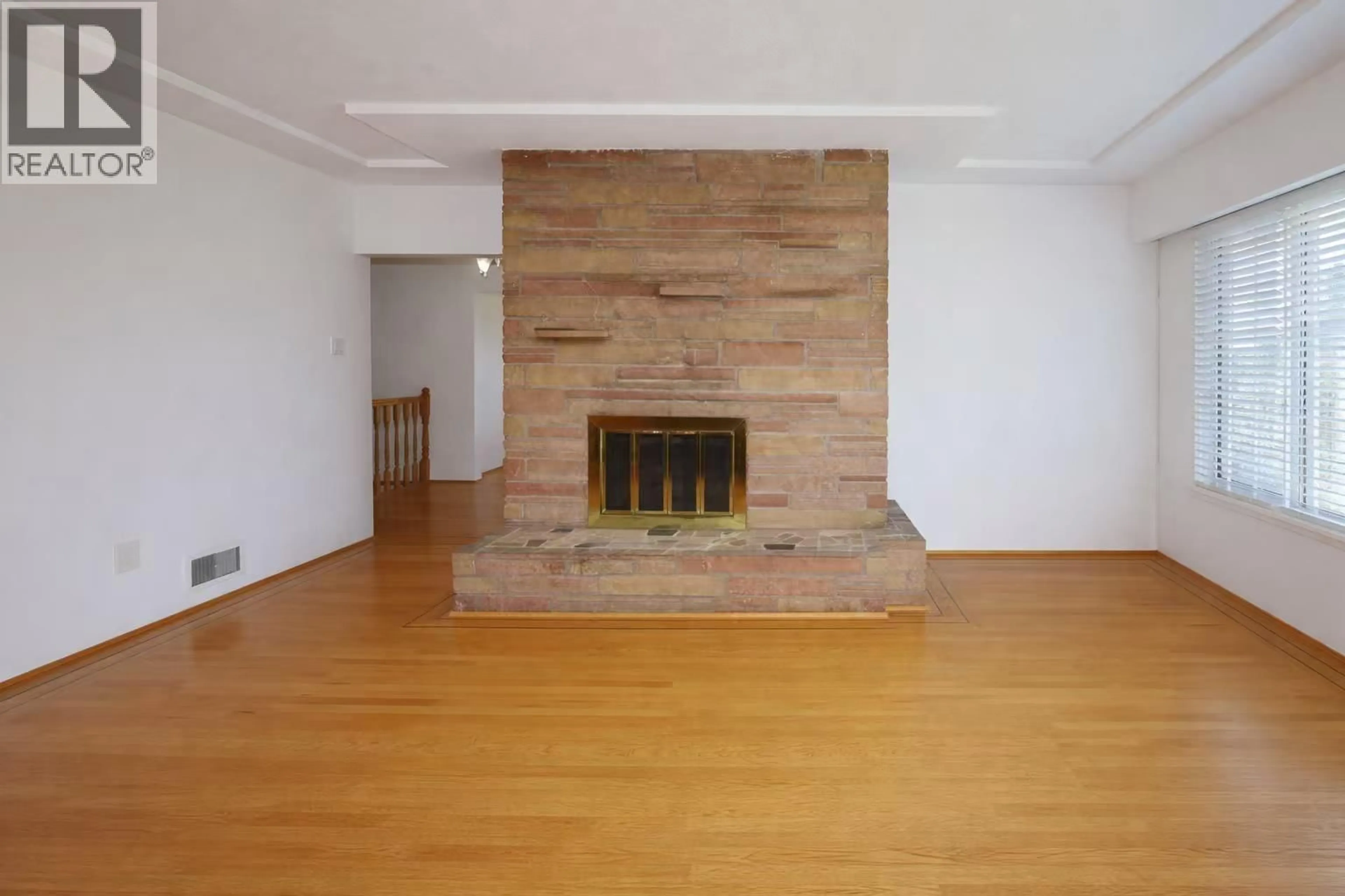 Living room with furniture, wood/laminate floor for 1563 59TH AVENUE, Vancouver British Columbia V5P2G8