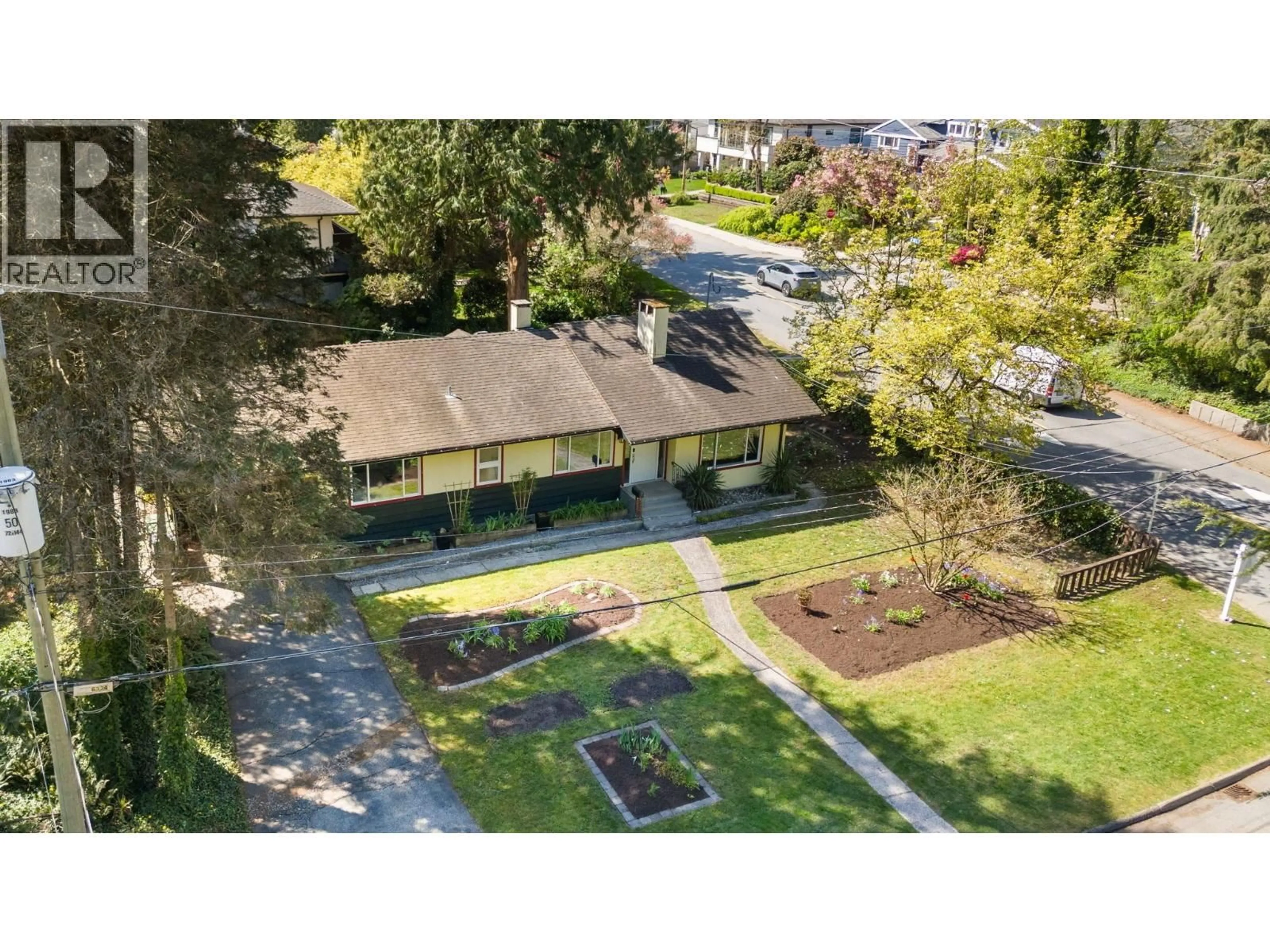 A pic from outside/outdoor area/front of a property/back of a property/a pic from drone, street for 2195 CORTELL STREET, North Vancouver British Columbia V7P2A8